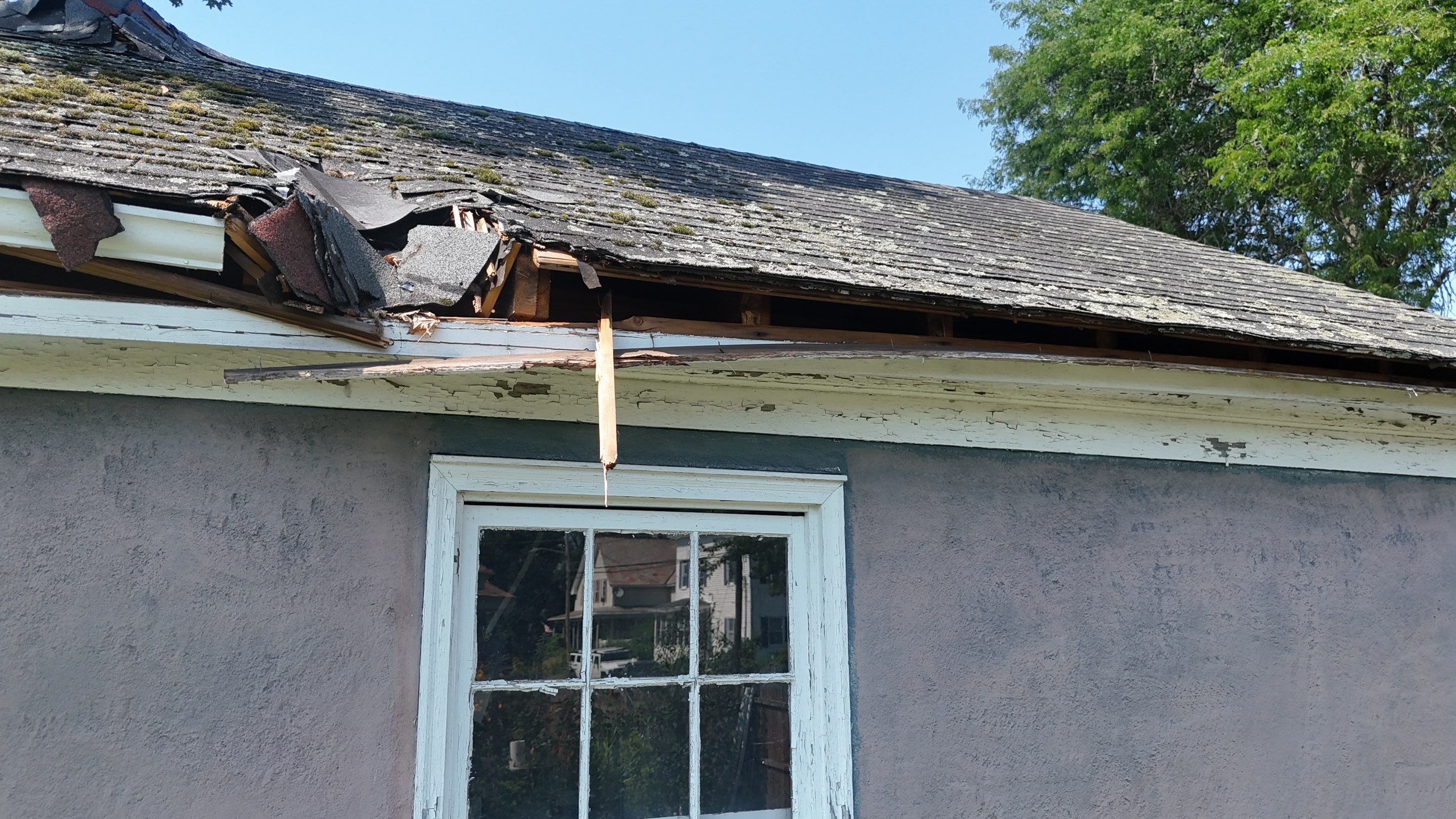 Garage Roof Replacement & Trim Repair by Mighty Dog Roofing of Greater Middlesex County