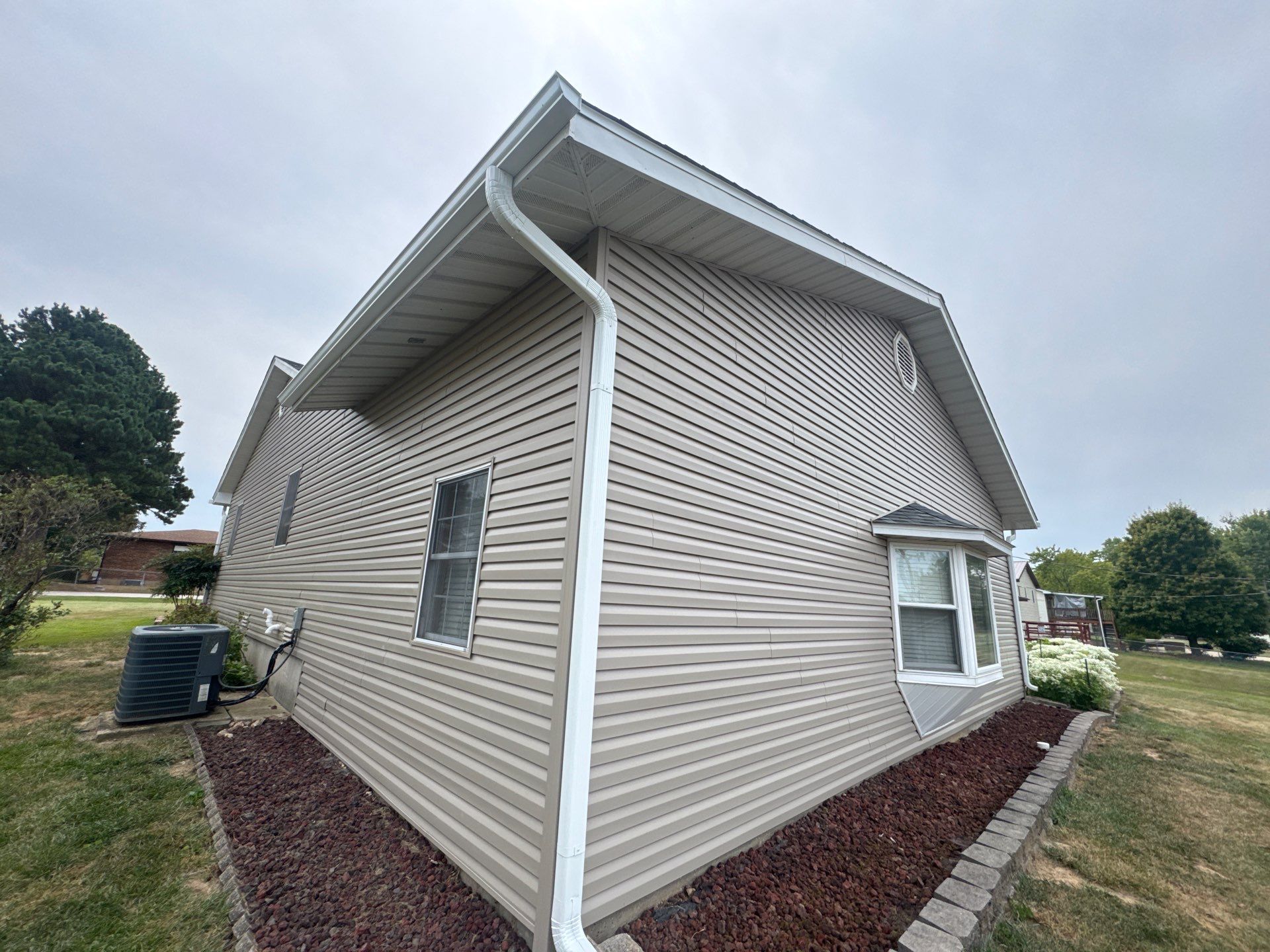 Residential Roof + Gutters & Downspouts Install  by Titan Commercial & Residential Roofing 