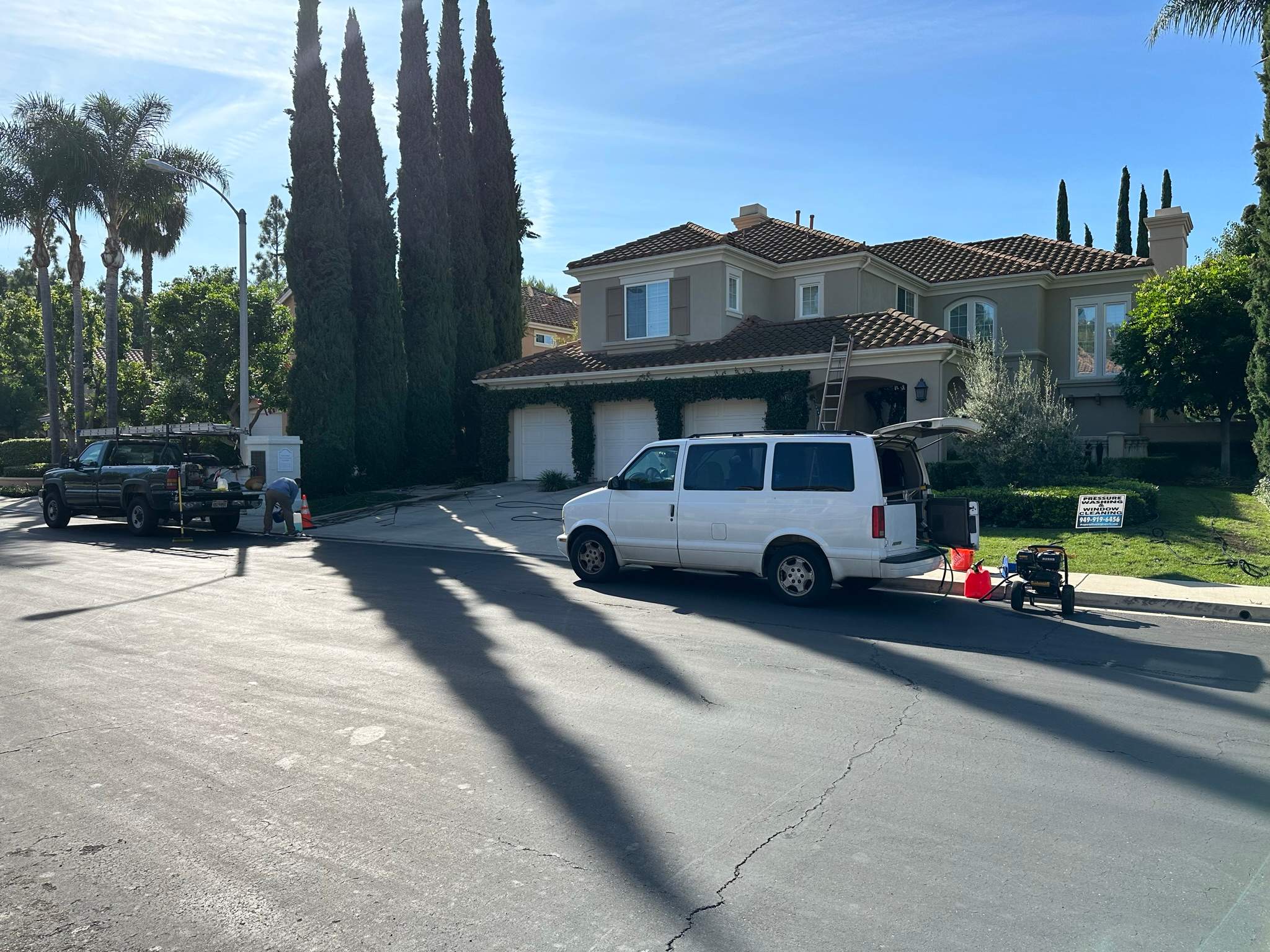 Roof wash on this dirty roof covered in algae by Property Cleaning Experts, LLC
