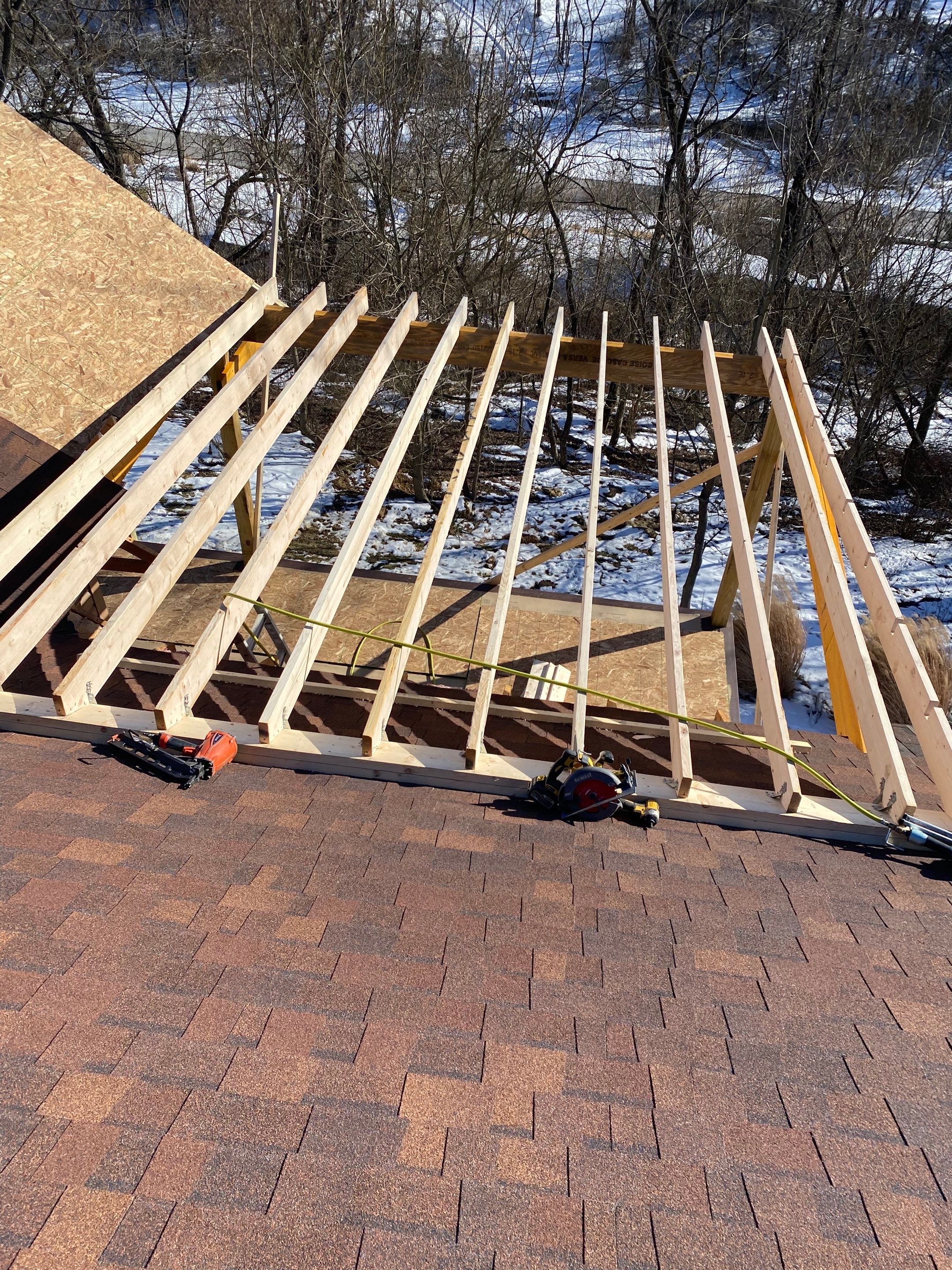 Deck and Roof Build by Cousins Roofing Siding & Decks