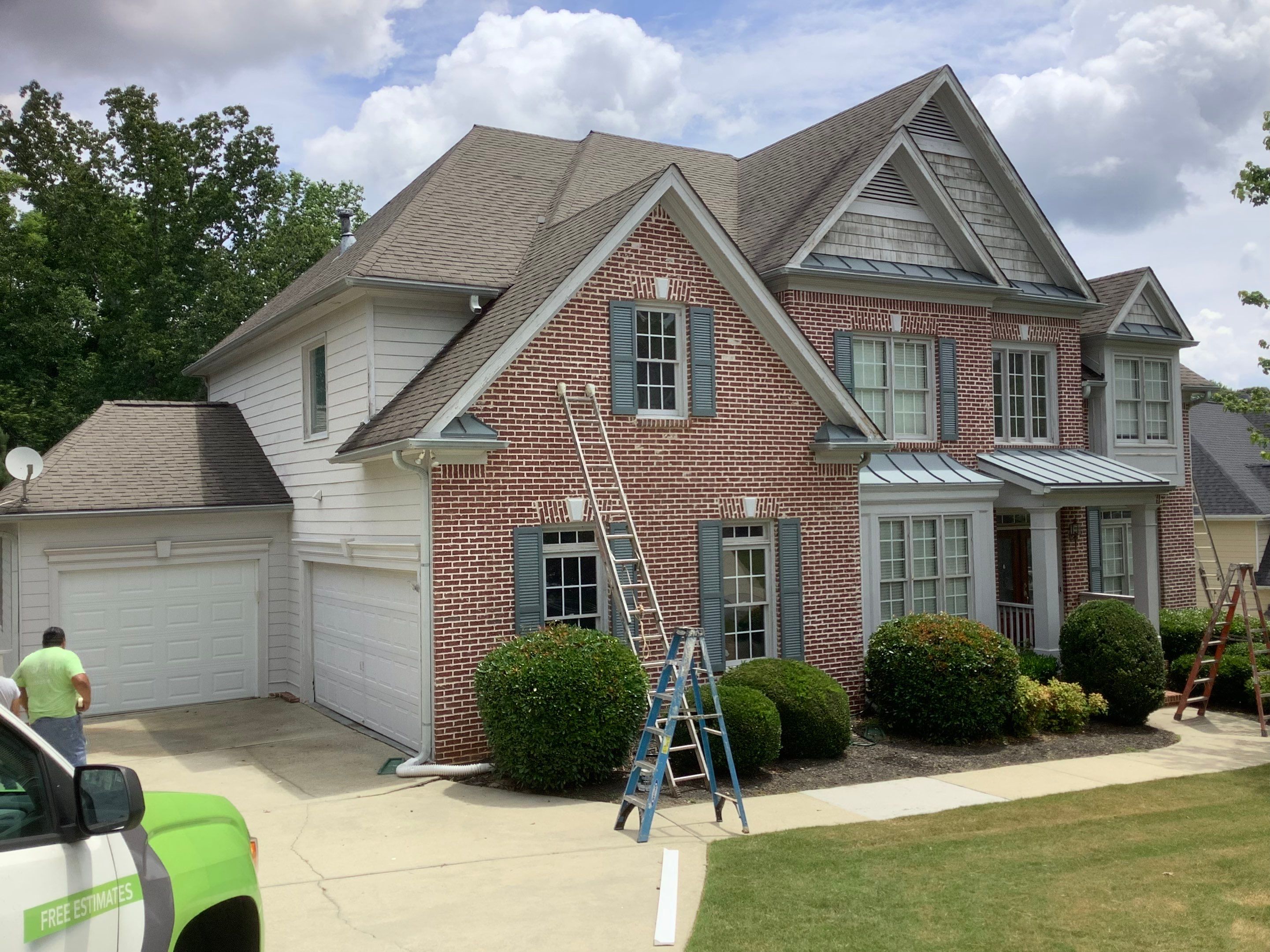 Exterior Painting and Deck Refinishing for Dacula Residential Home by Swift Home Renovations