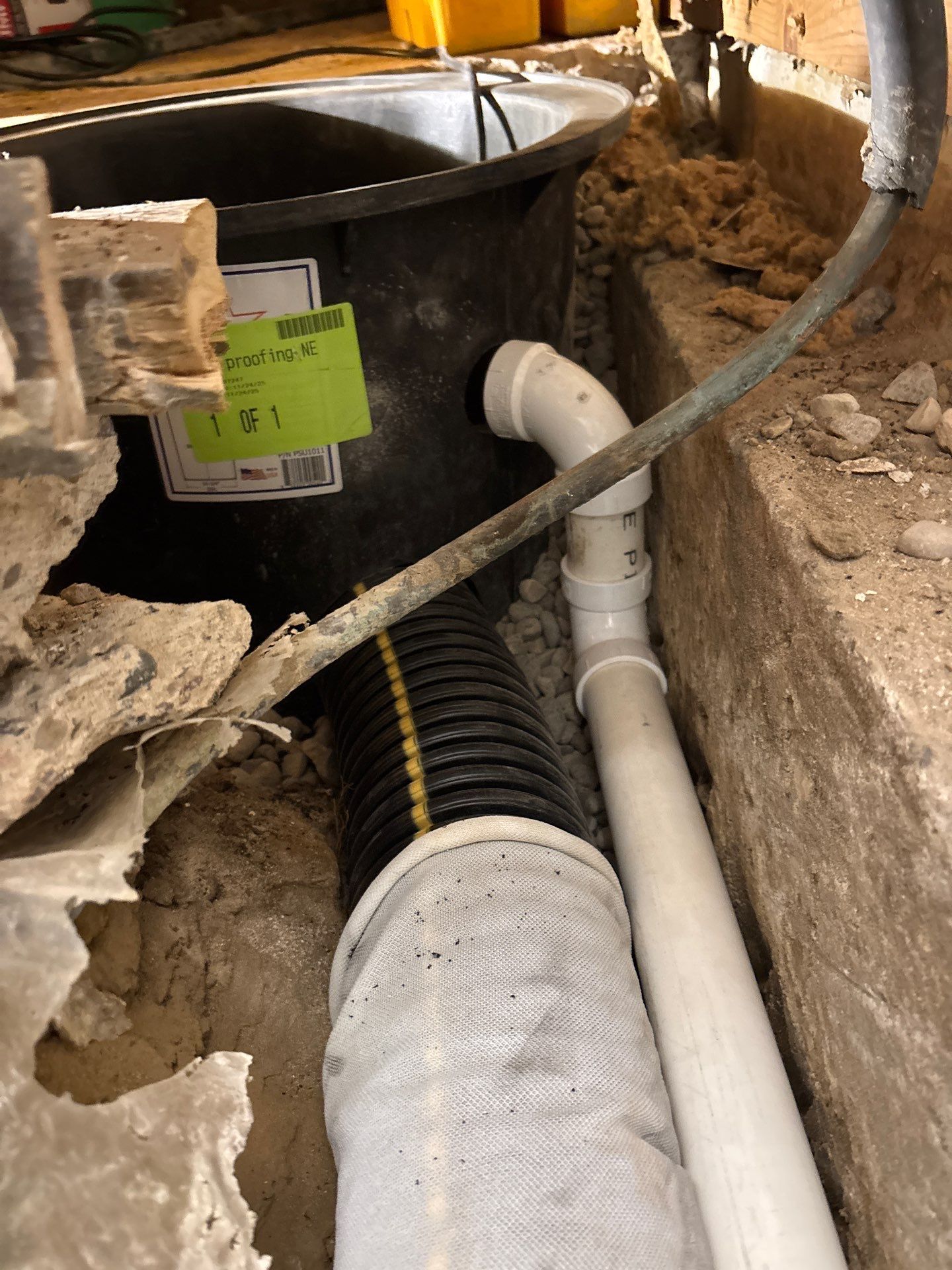Drain tile and sump pump for George by Waterproofing Northeast