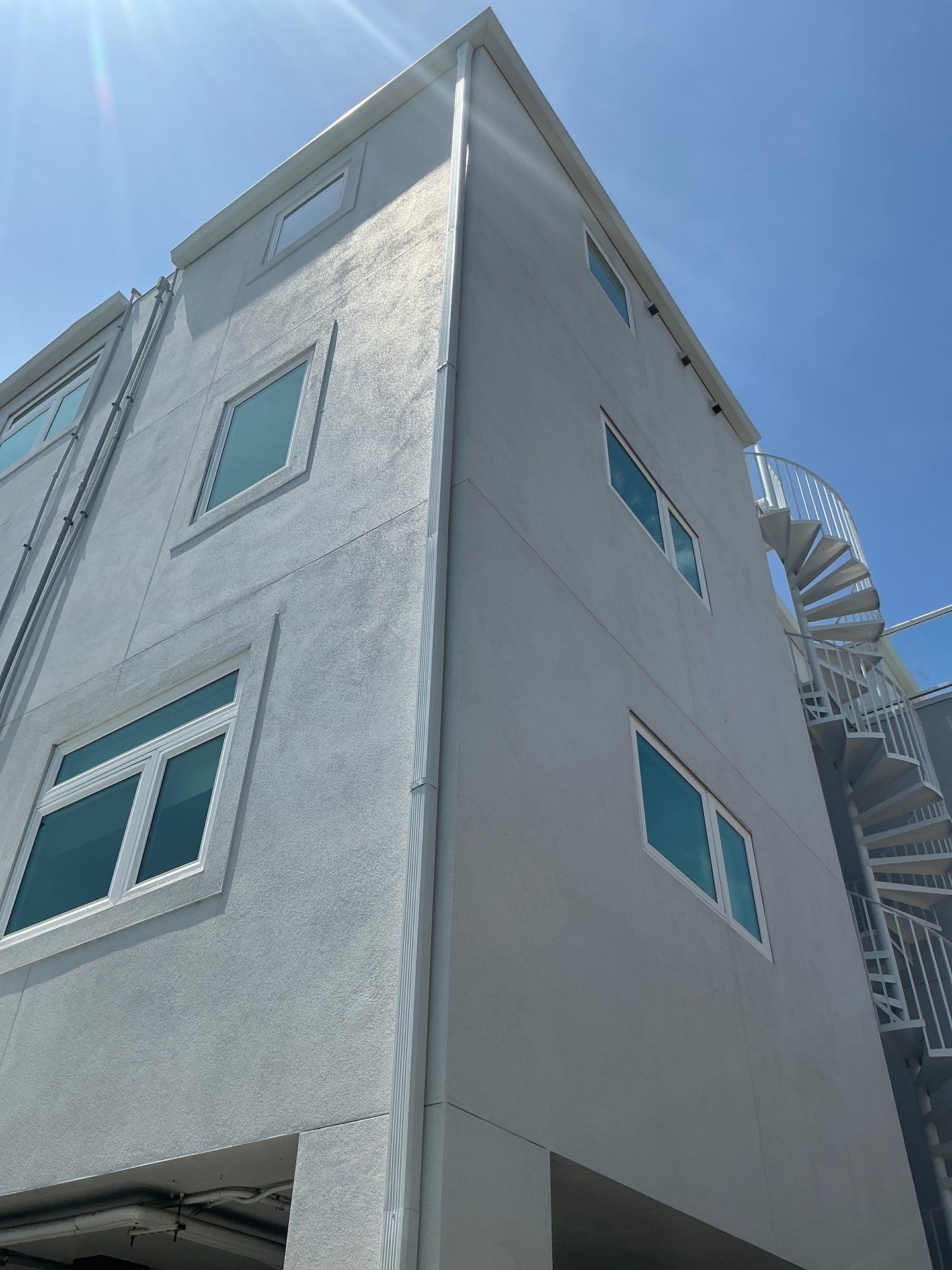 Seamless Gutters with Downspouts in Siesta Key FL by Gutter Professors