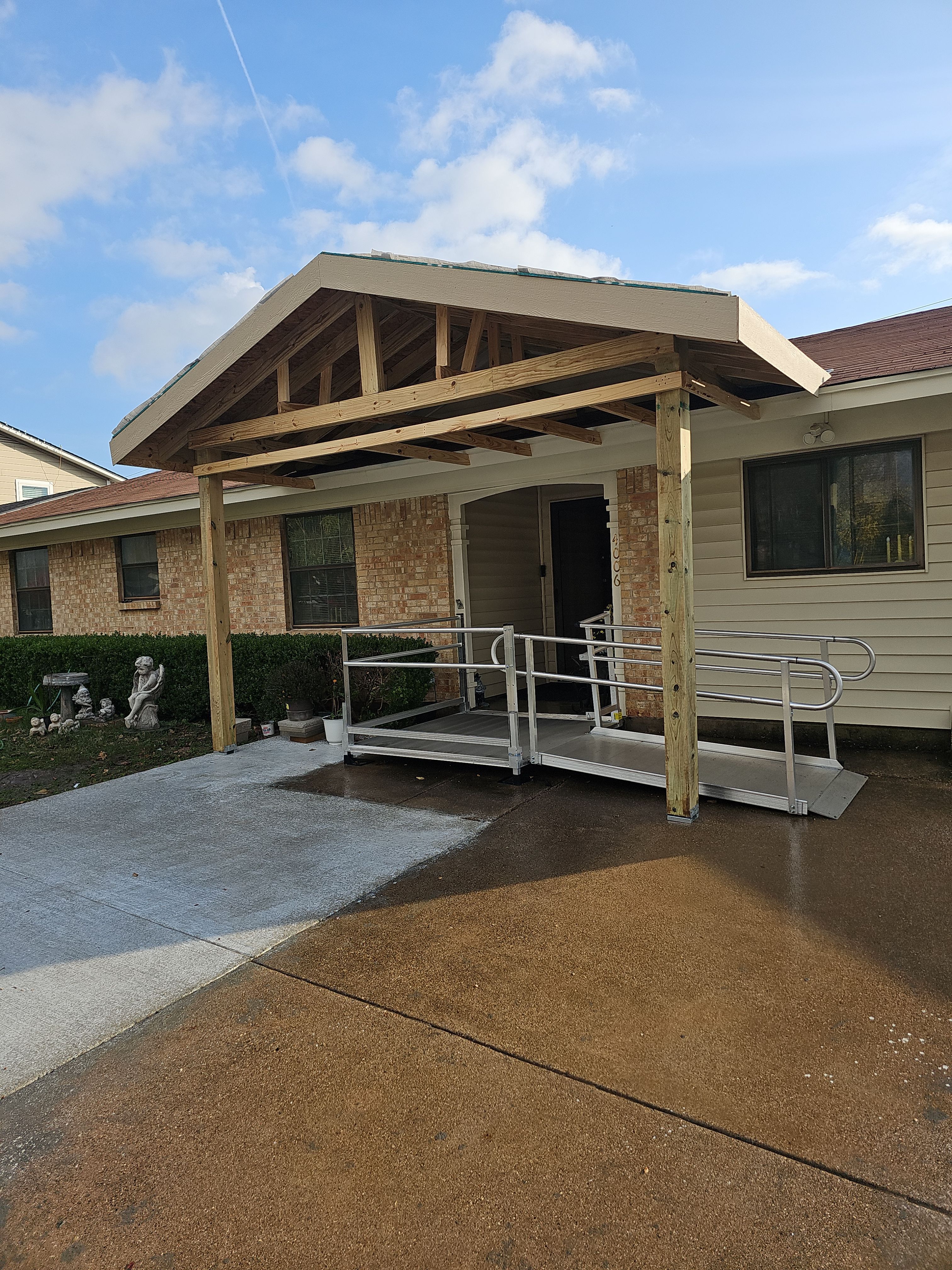 Complete Exterior Renovation: Roof, Custom Porches & Concrete Patio in Garland, TX by road roofing llc