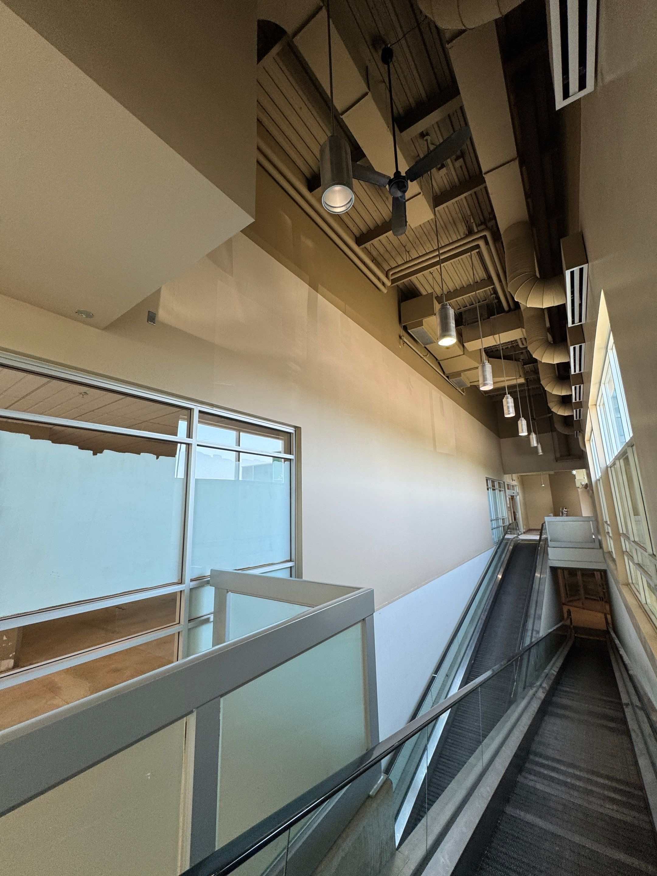 Commercial Prime & Paint Project-30ft height by YVR Construction Group