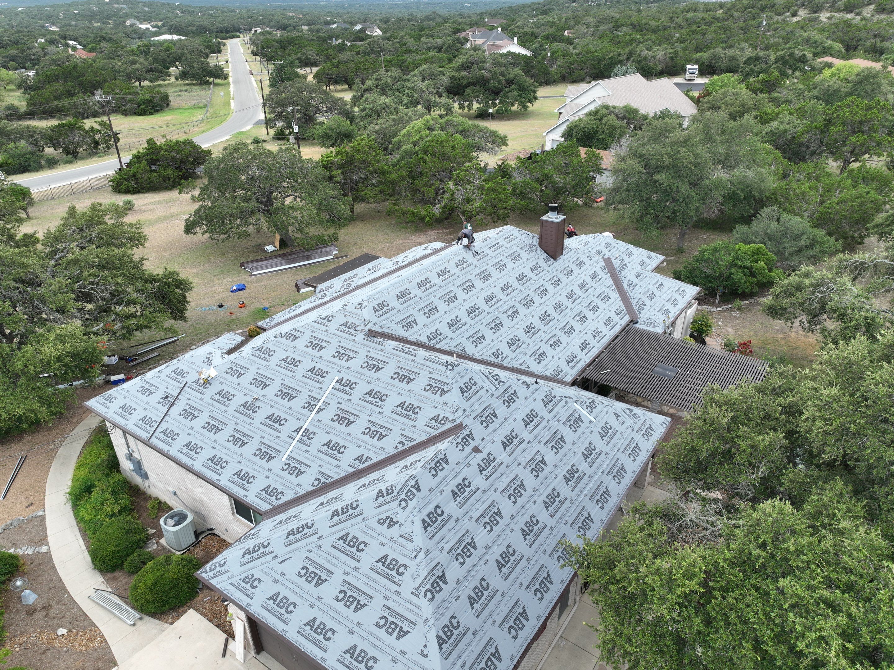 Residential Metal Roof Installation using McElroy Metal by Premier Roofing and Contracting