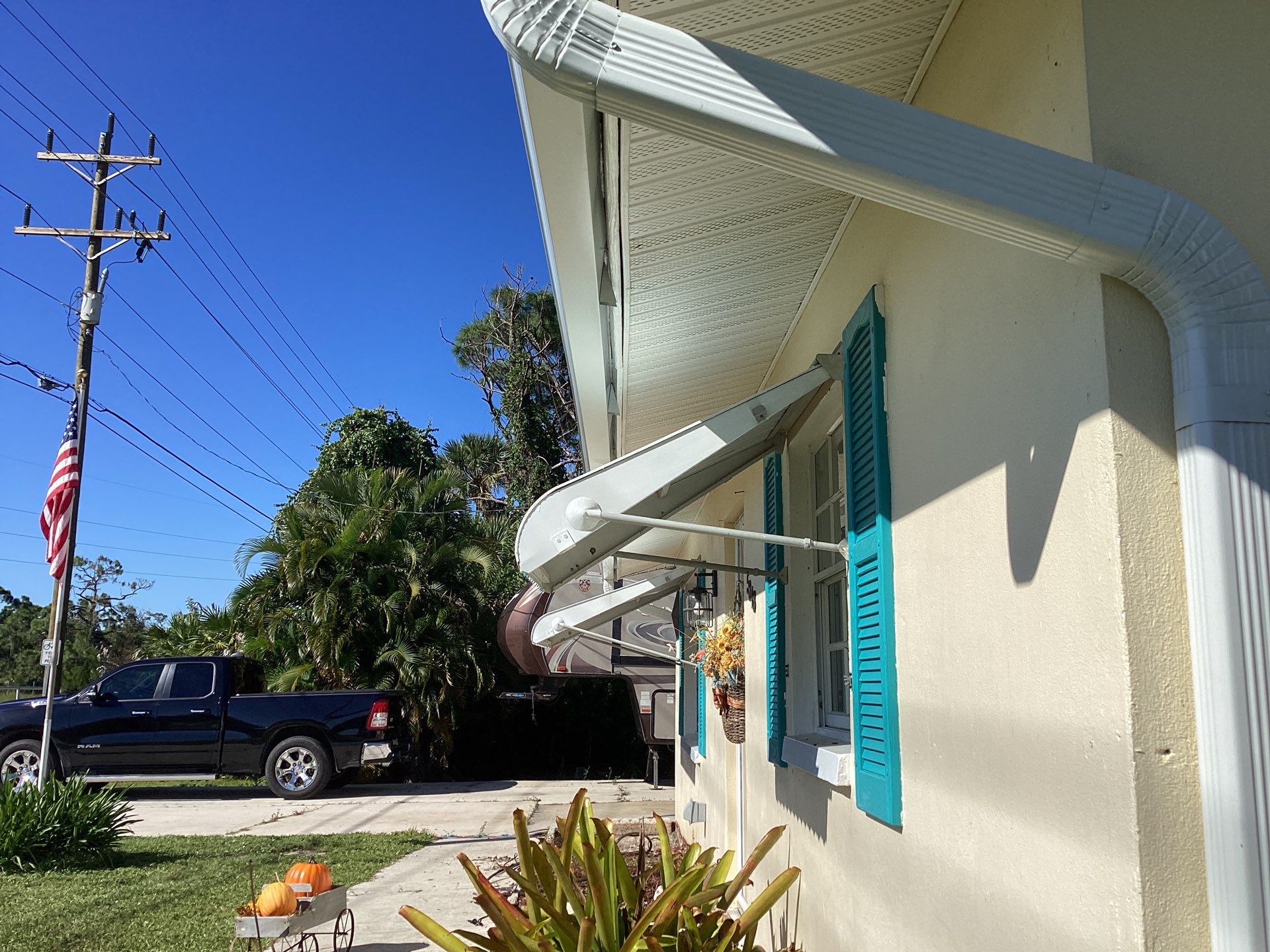 3x4 Downspouts and Seamless Gutters for Coastal Homes in St James City FL by Gutter Professors