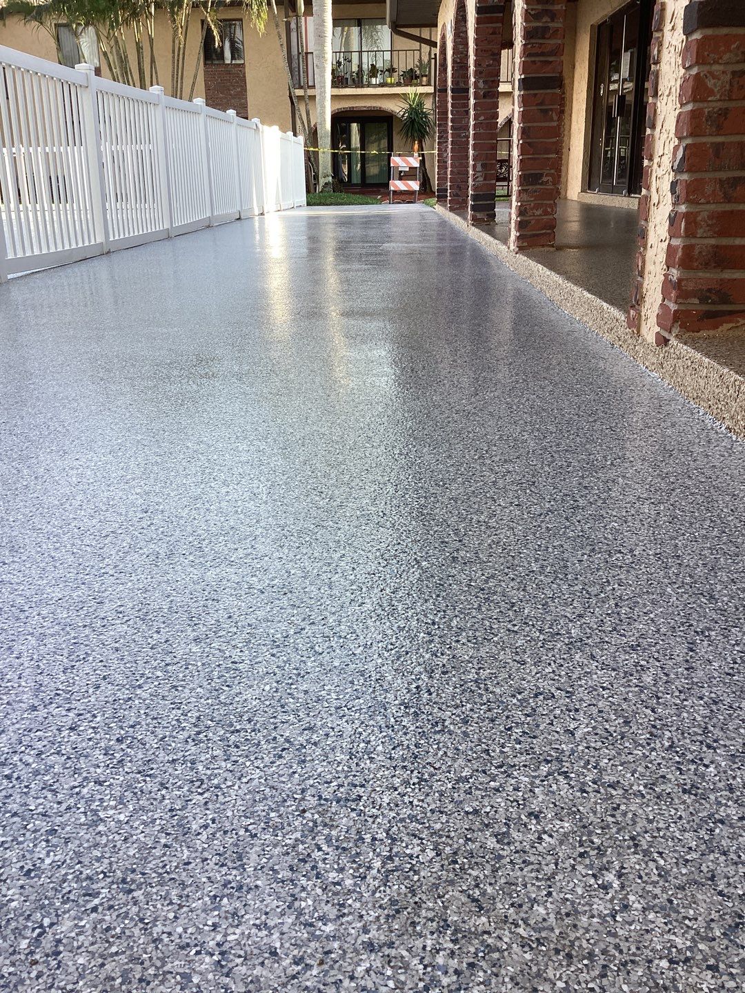 Pool Deck using Orbit and Tidal Wave by Amvet concrete coatings llc