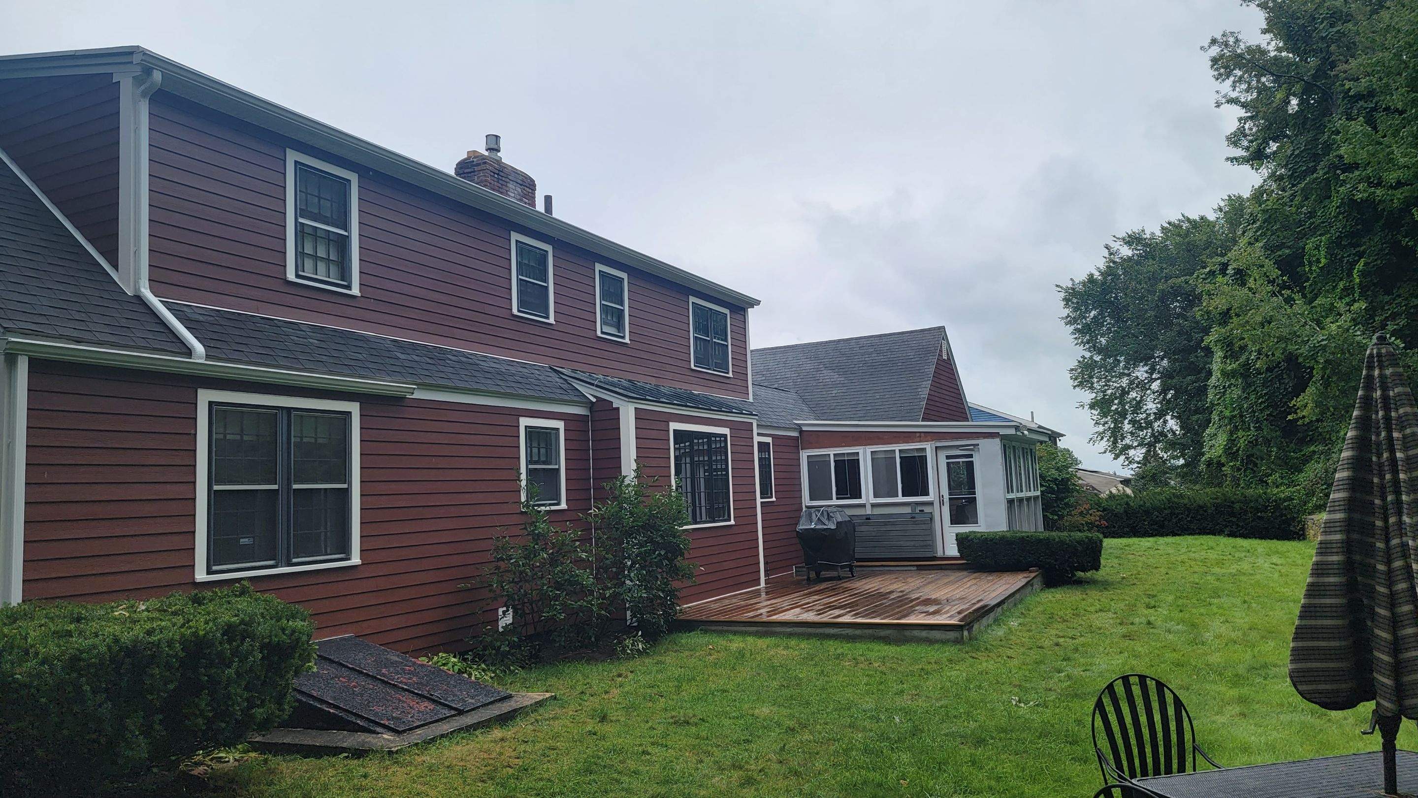 Siding Installation using James Hardie Countrylane red by UBrothers Construction