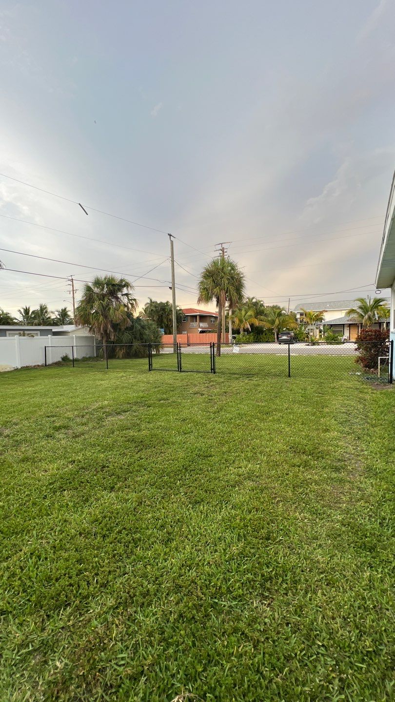 Holmes Beach, FL 4ft. Tall Black Chain-link  by Asap fence and gates, LLC
