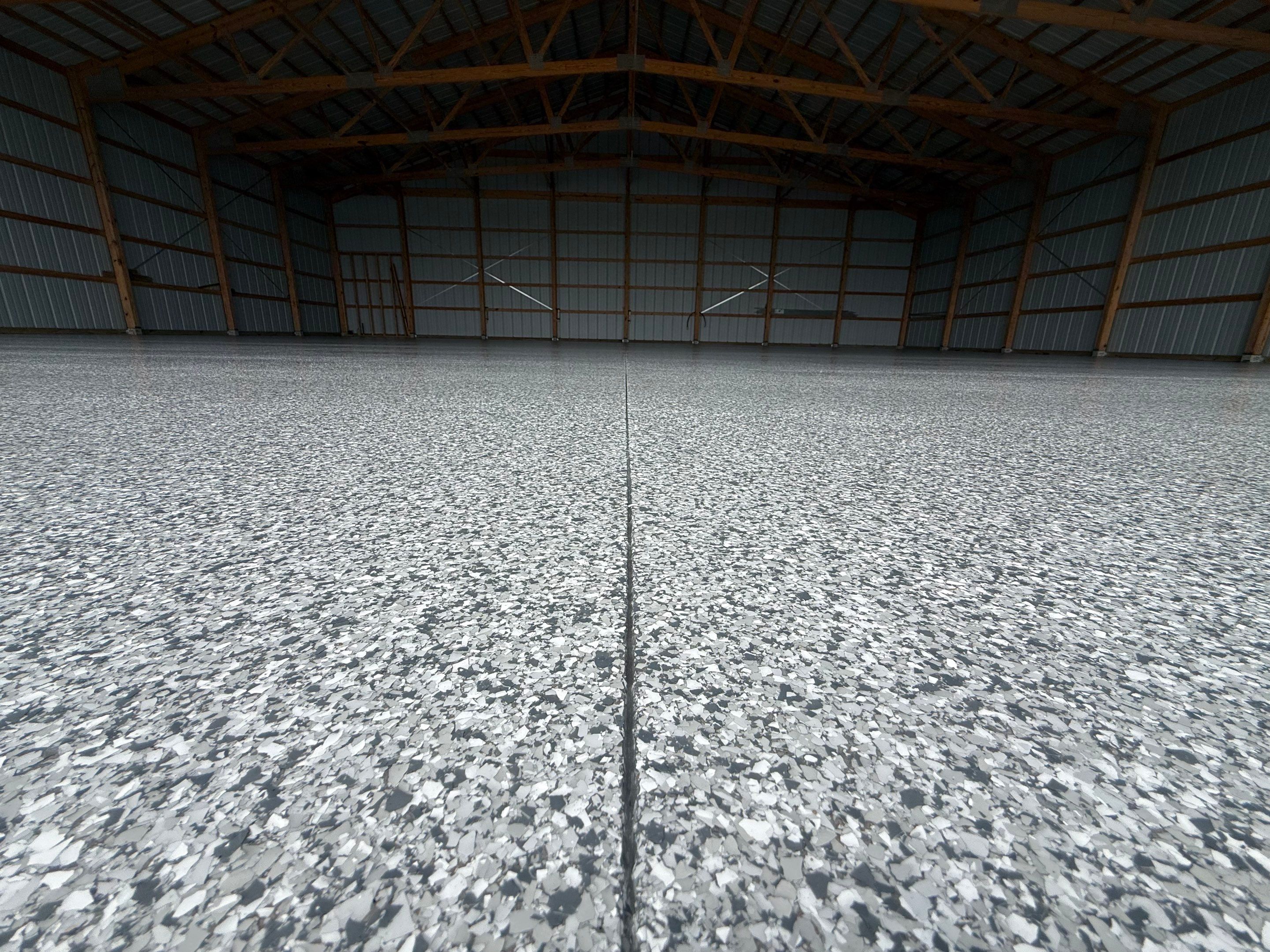 Durable Grey Speckled Epoxy Floor Coating for Yankton Shop by Select Painting, Coatings & Garage Cabinets