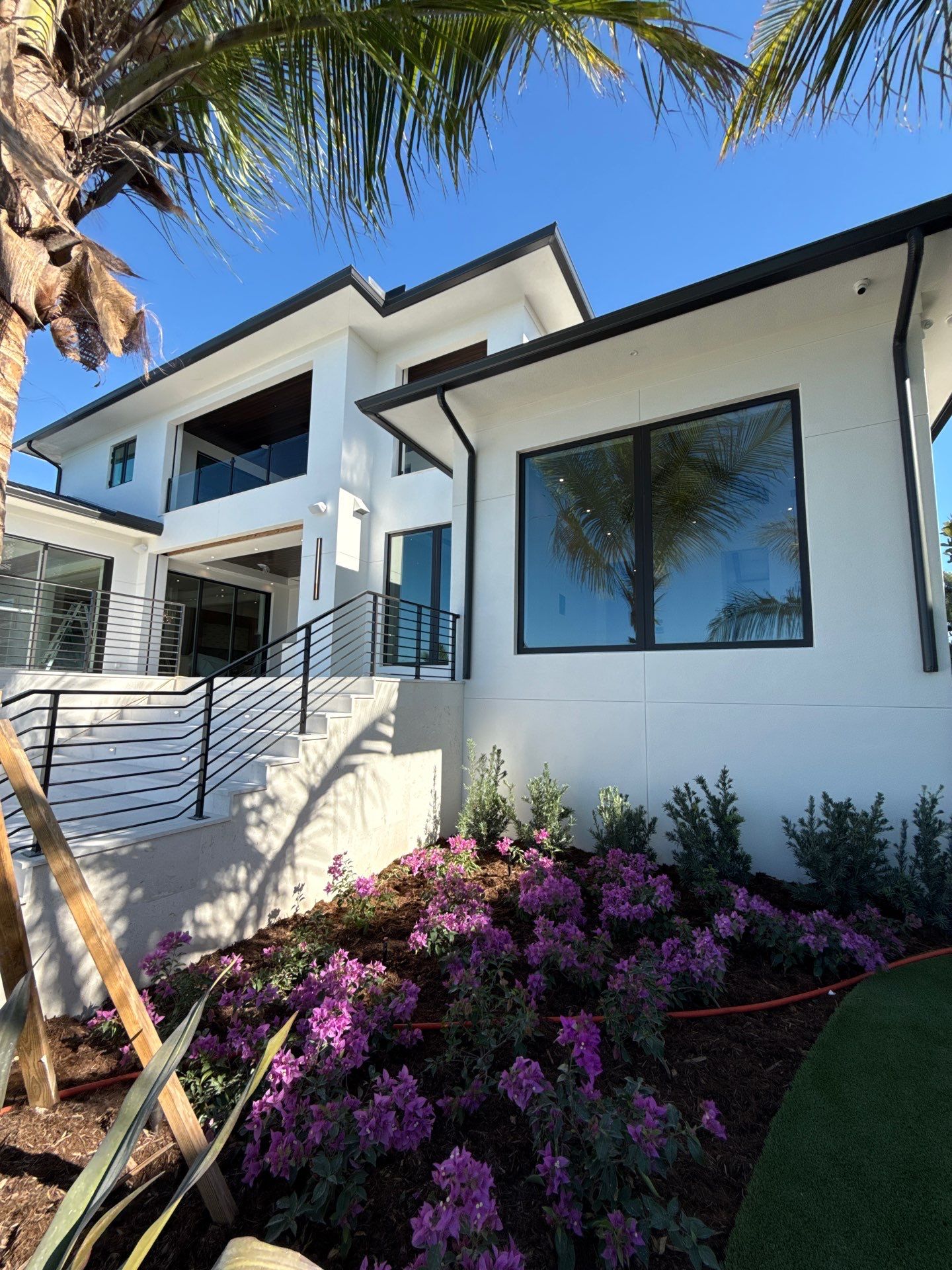 Seamless Aluminum Gutter Installation using black seamless gutters in Sarasota FL by Gutter Professors
