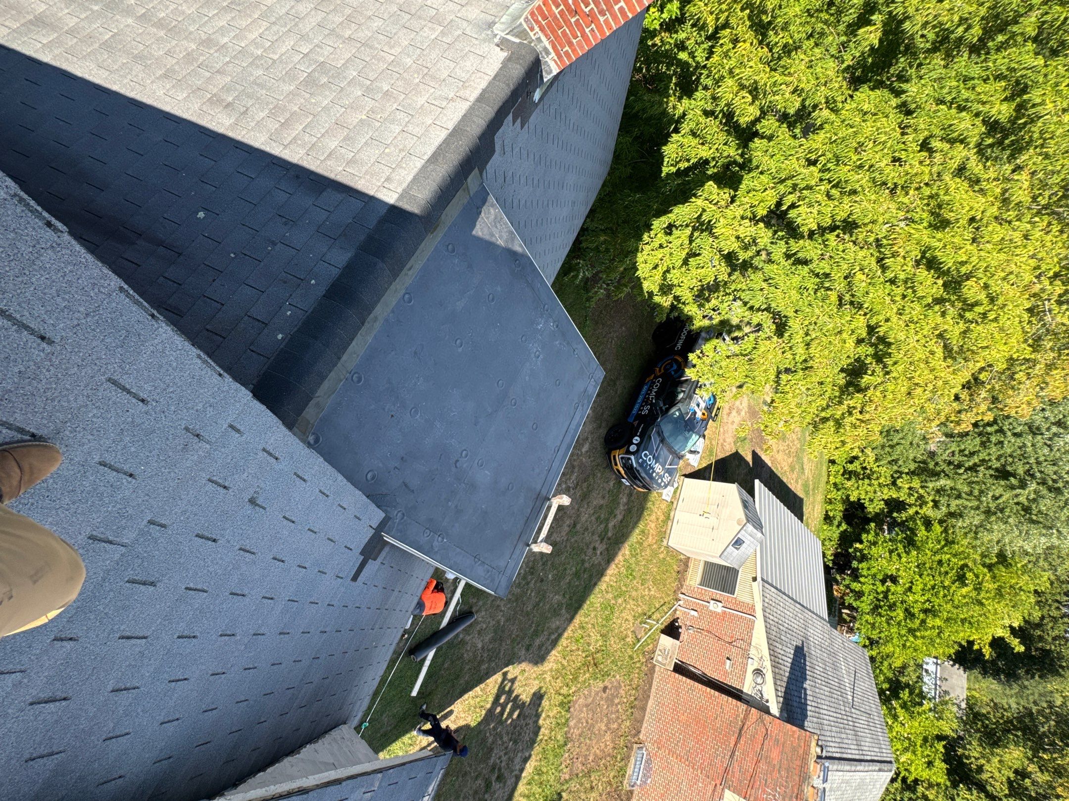 Dormer Reconstruction and Rubber Roof Repair - Manchester NH by Compass exteriors