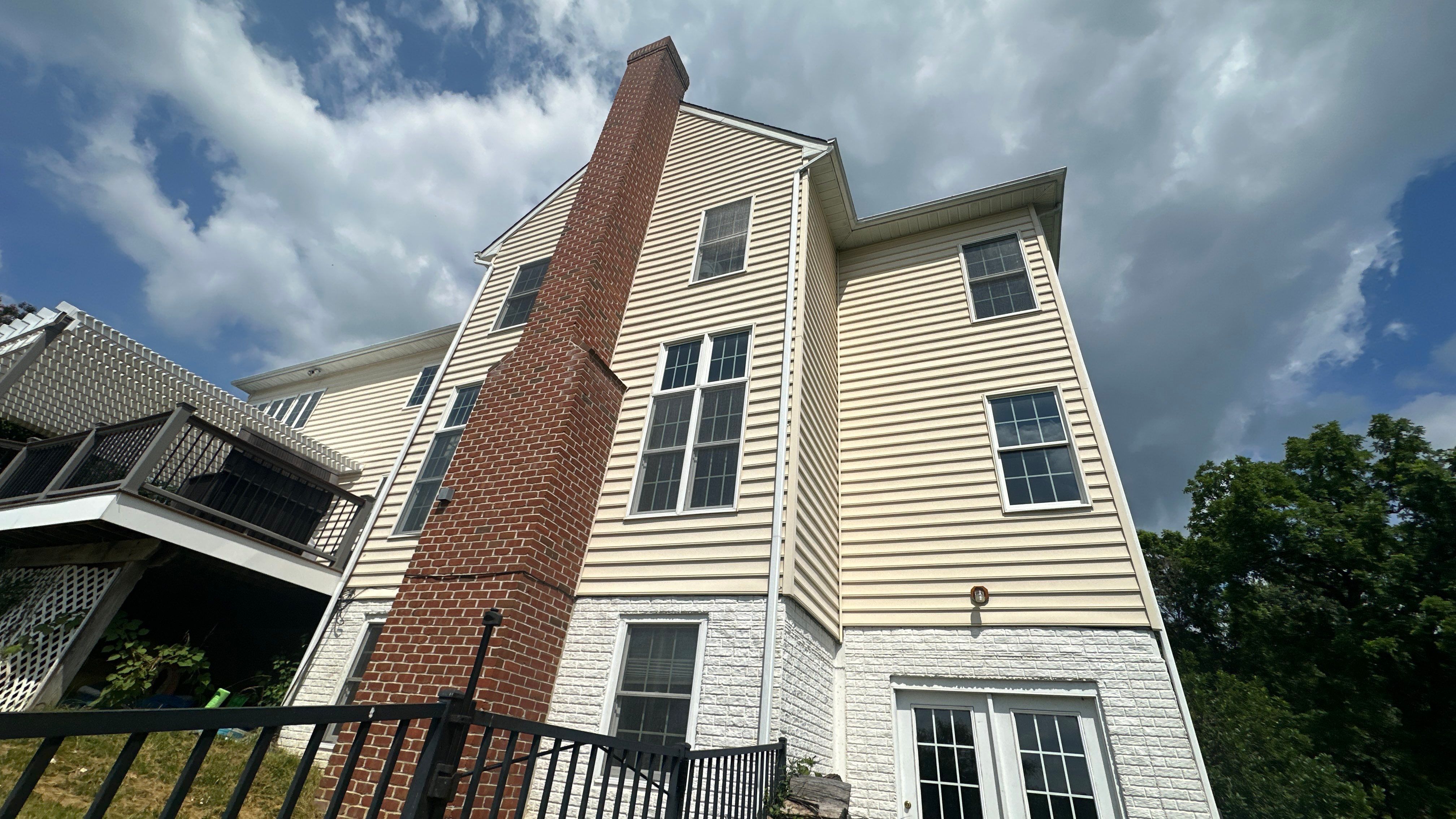 Exterior House Washing and Pool Deck Restoration in West Friendship by Baltimore Pressure Washers Inc.