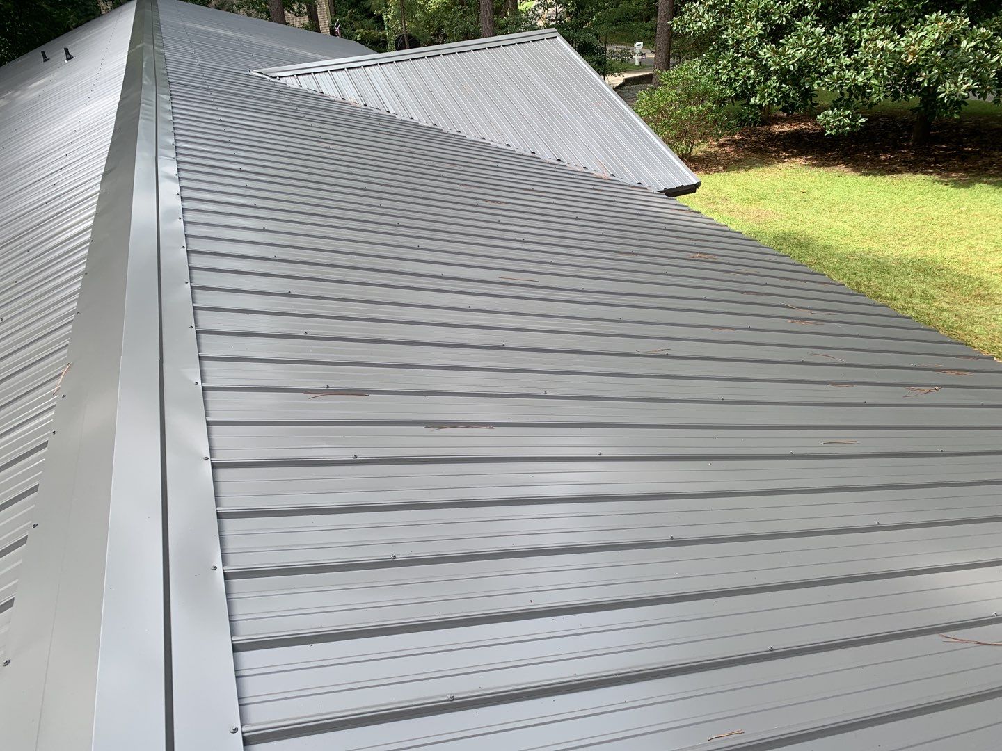 Re Roof (metal roofing) by American Roofing NC