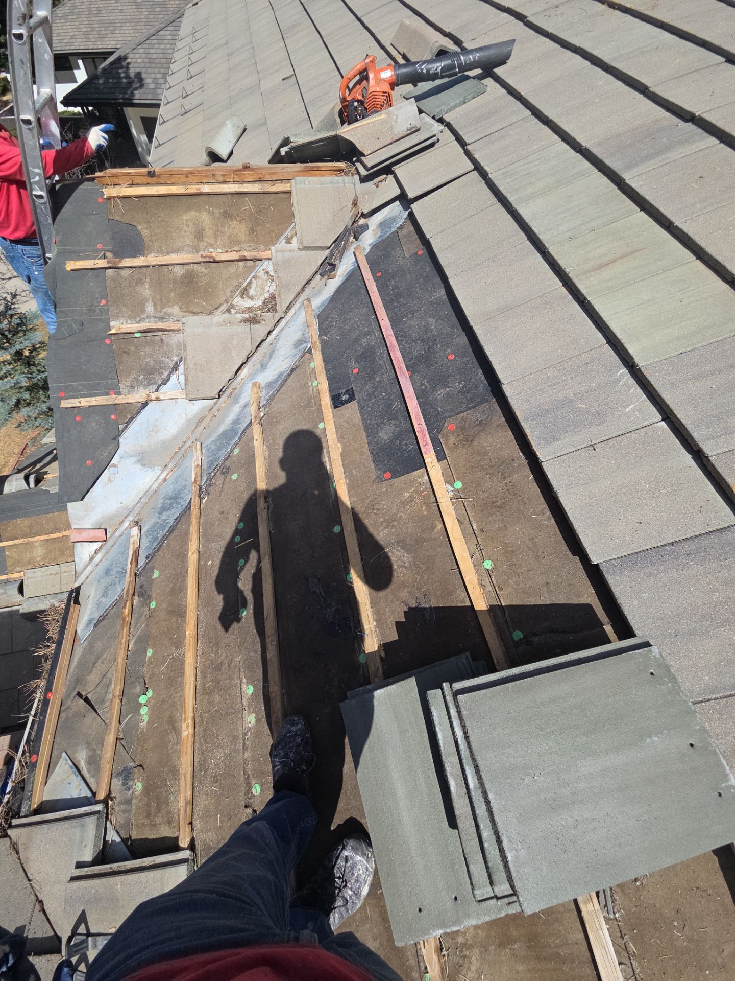 Tile Repair & New Gutters by RTP Roofing Company