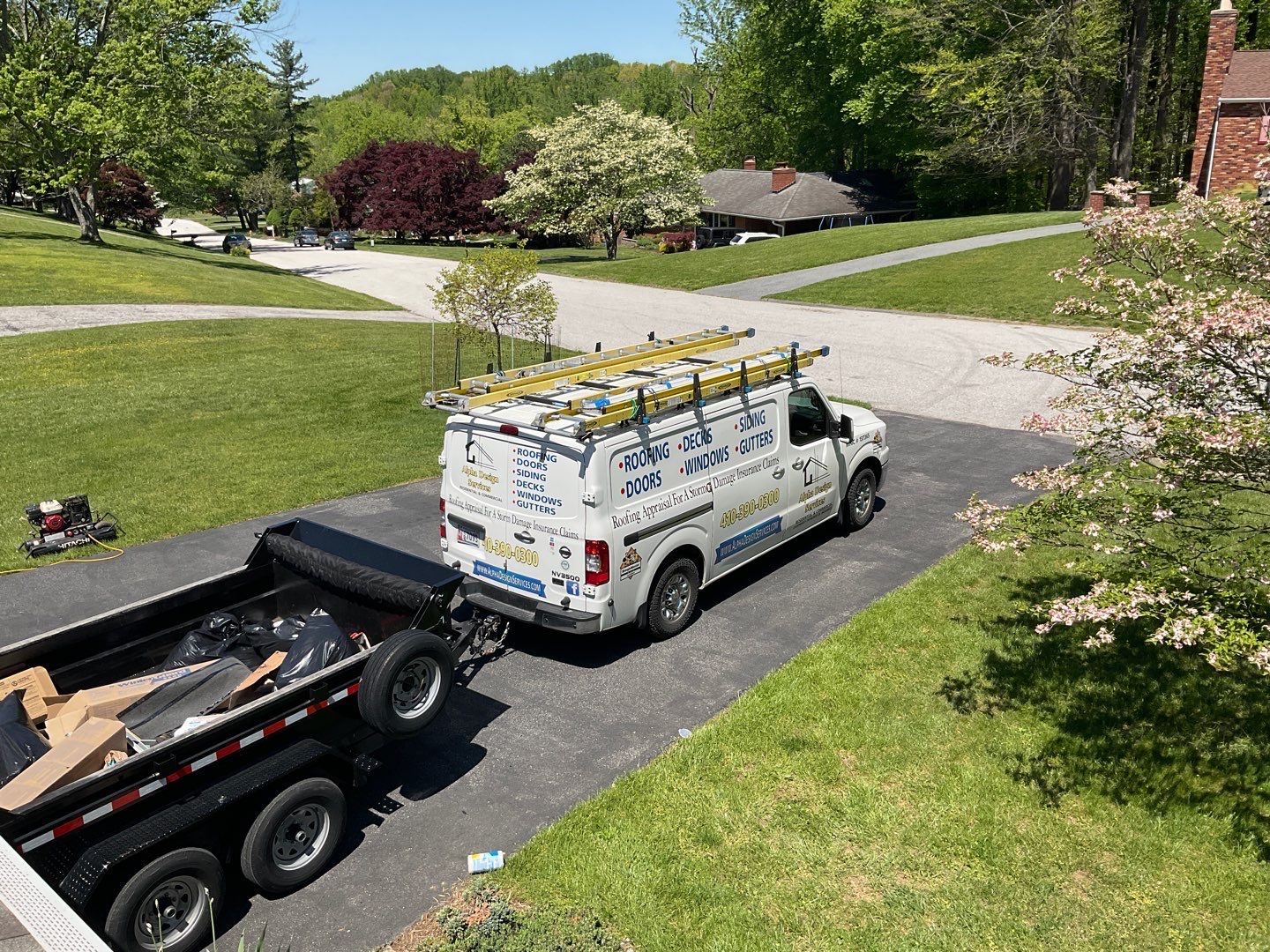 Residential Roofing Installation using Landmark Shingles Color Weatherwood by Alpha Design Services