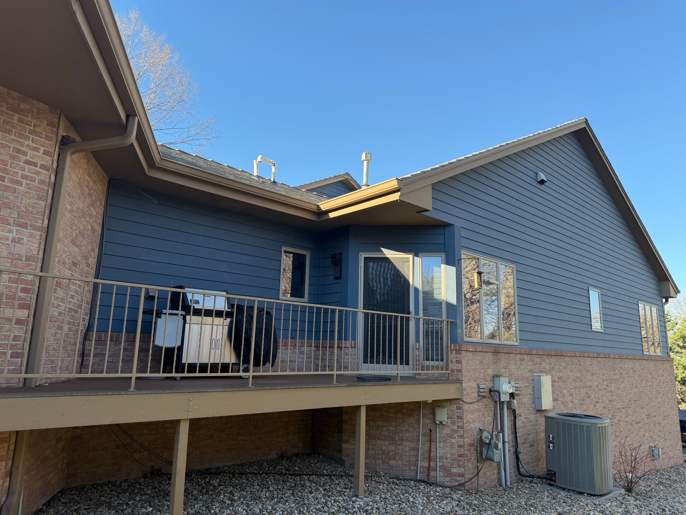 Residential Exterior Painting and Siding Refresh in Sioux Falls by Select Painting, Coatings & Garage Cabinets
