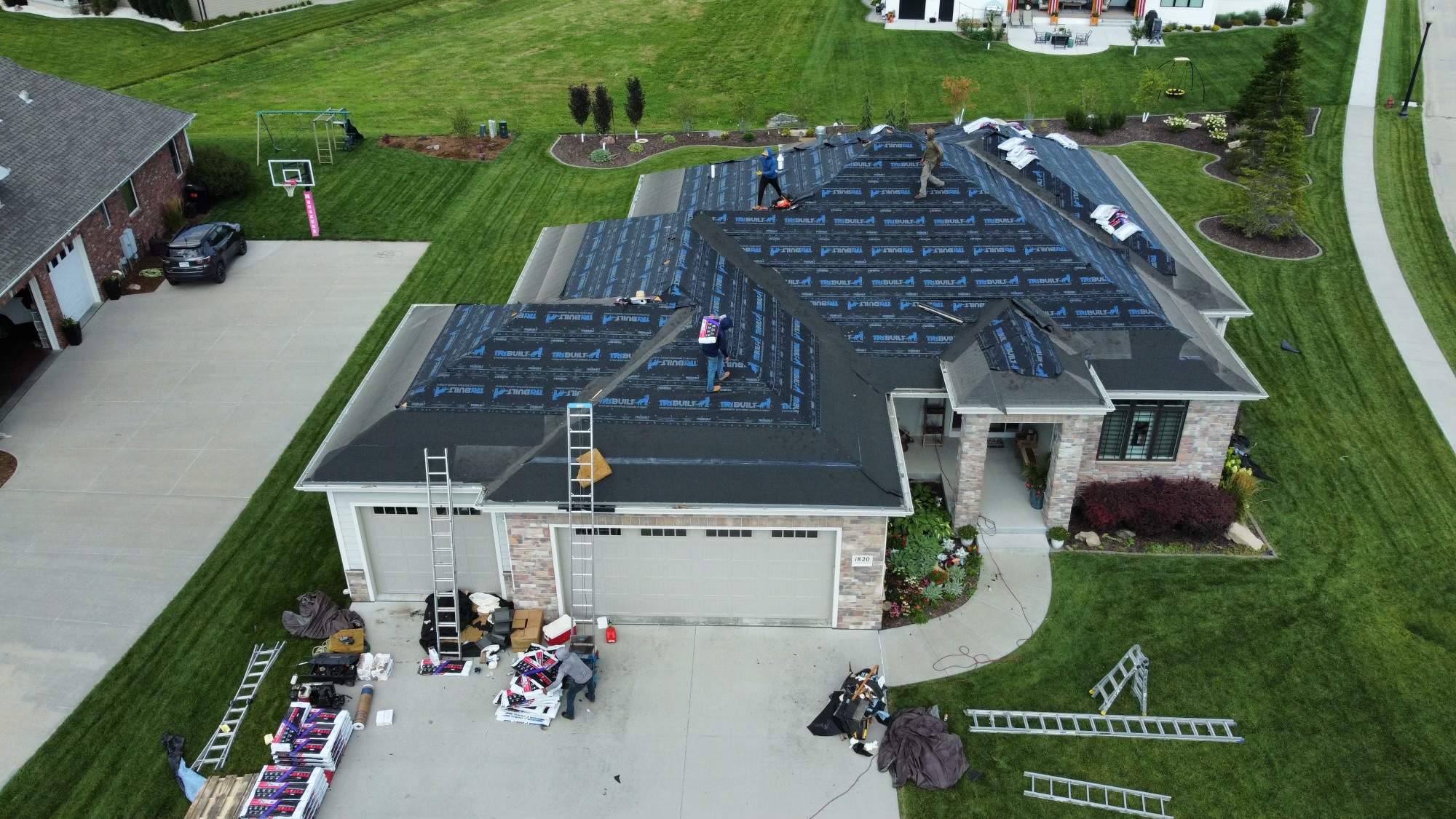 Residential Roofing Installation using TAMKO TITAN WEATHERED WOOD by Lightning Exteriors