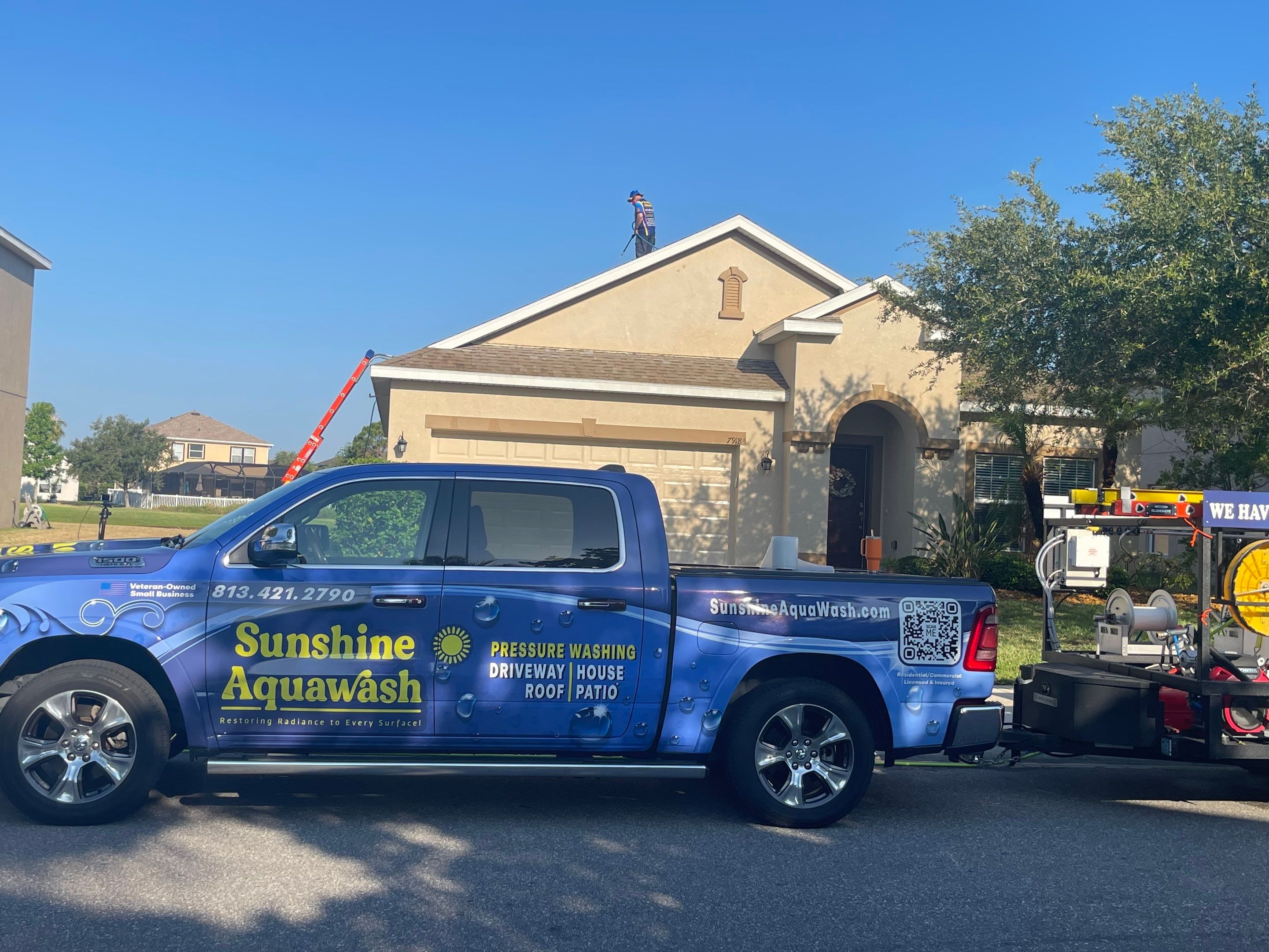 Asphalt Shingle Roof Soft Wash Cleaning & Concrete Pressure Washing in CopperStone Community, Parrish, FL by Sunshine AquaWash