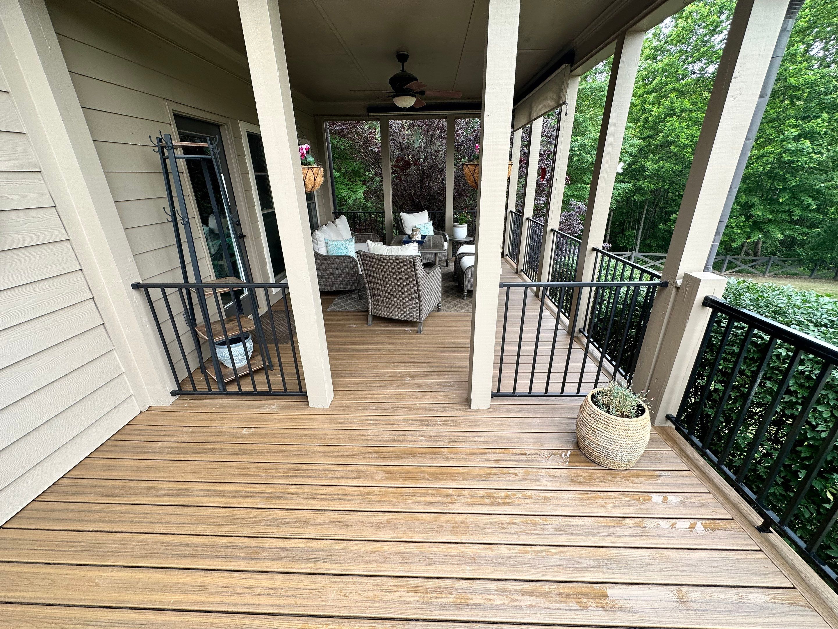 Composite Deck Flooring and Black Metal Railing Replacement in Dallas by Swift Home Renovations