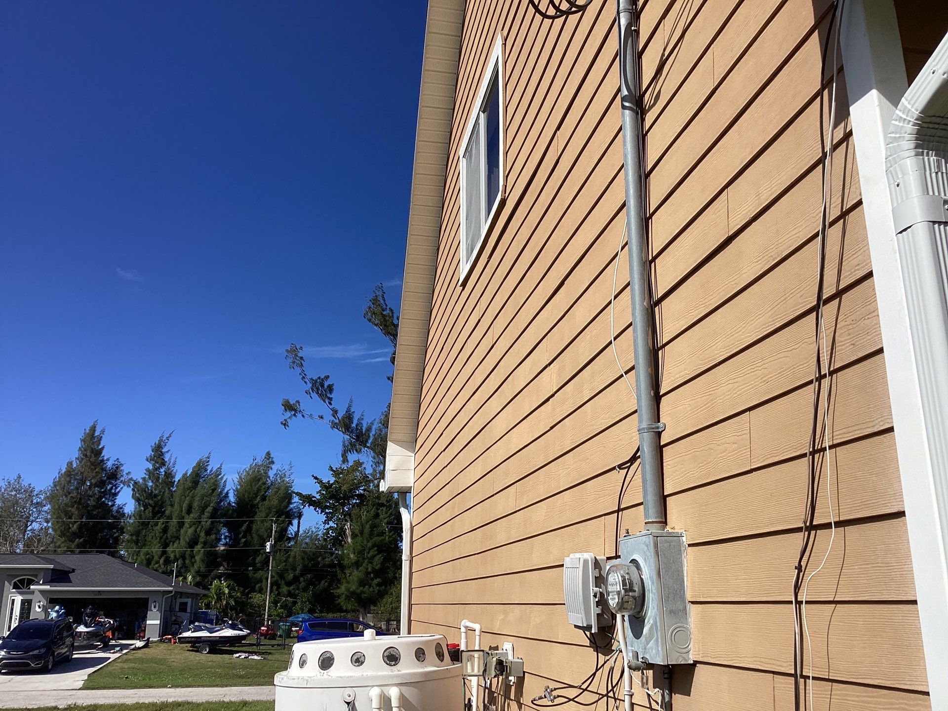 Soffit & Fascia White + New Downspouts by Gutter Professors