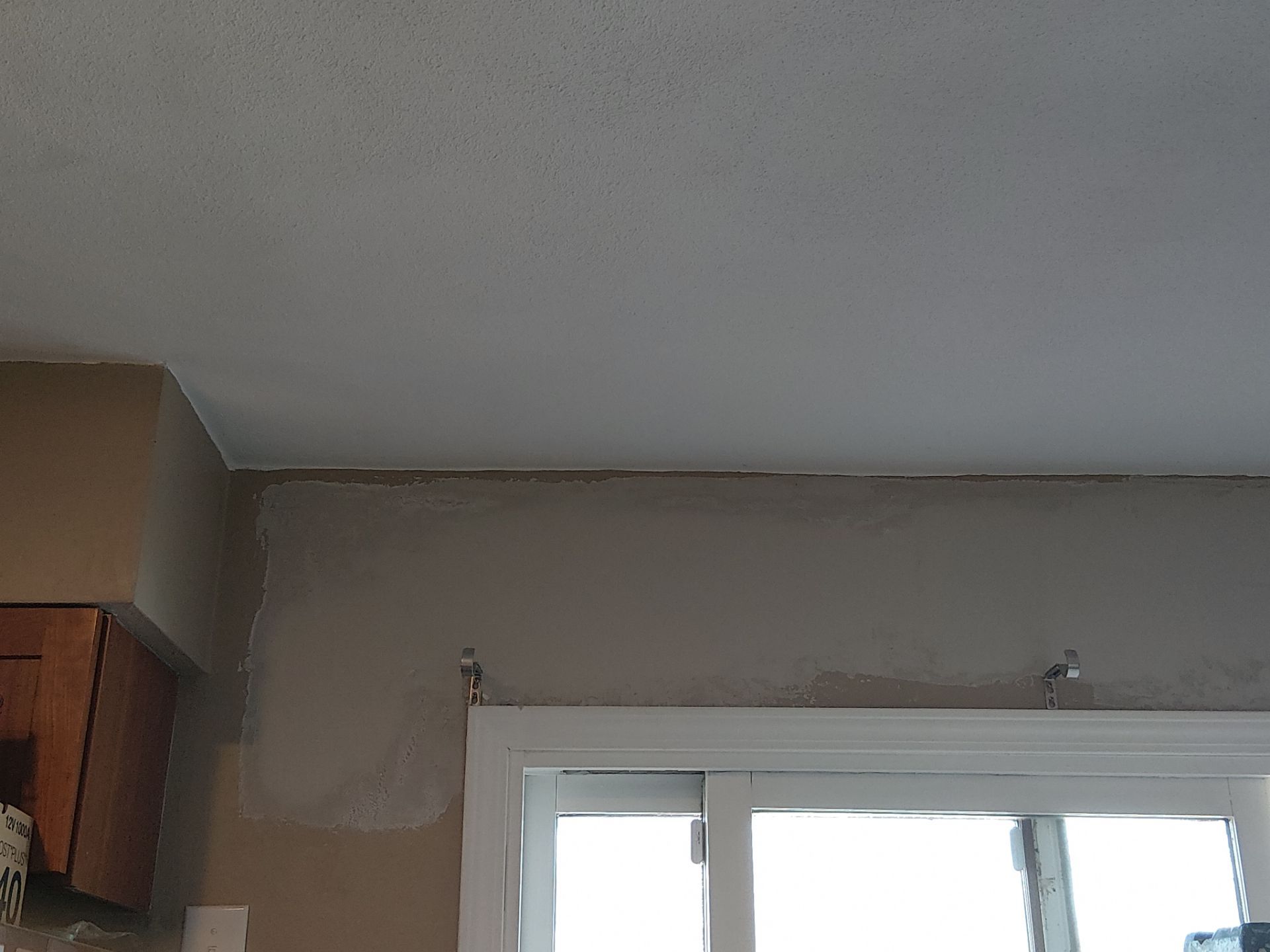 Drywall Repair Above Sliding Door + Seam Repair - Columbia, IL by Legendary Services Company LLC.