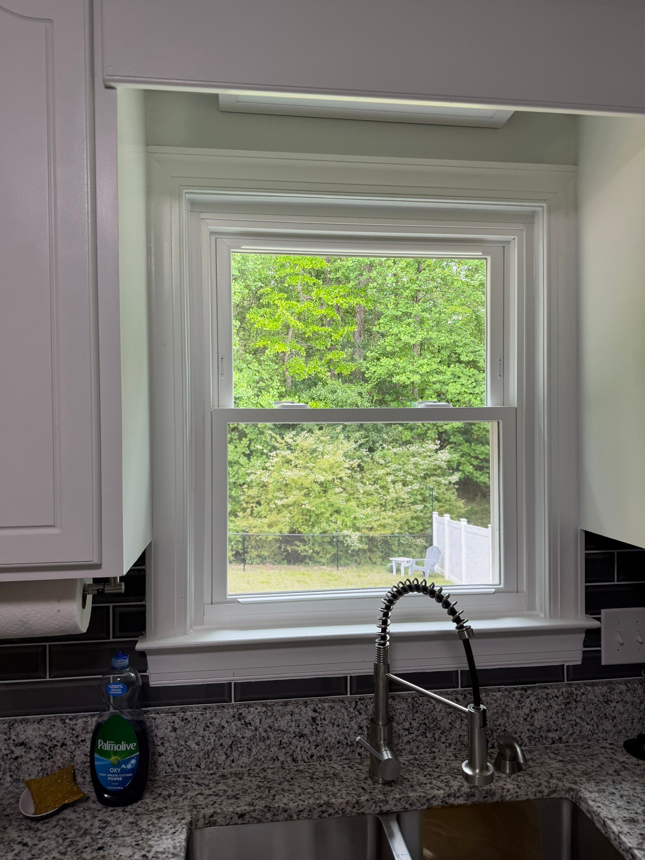 White Vinyl Double-Hung Window Replacement in Clayton by The Remodeling Company