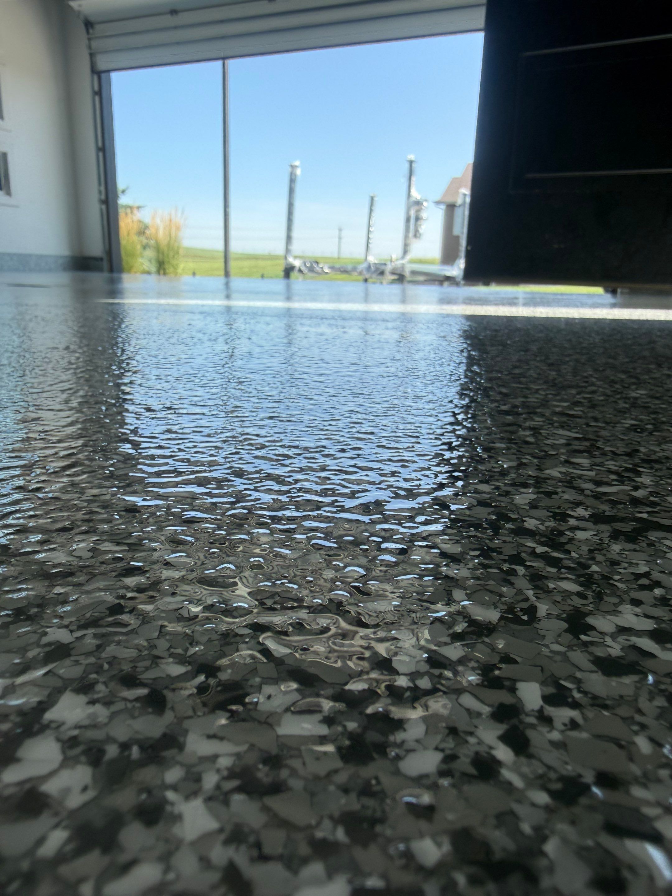 Gravel Flake Garage Floor Coating in Yankton by Select Painting, Coatings & Garage Cabinets
