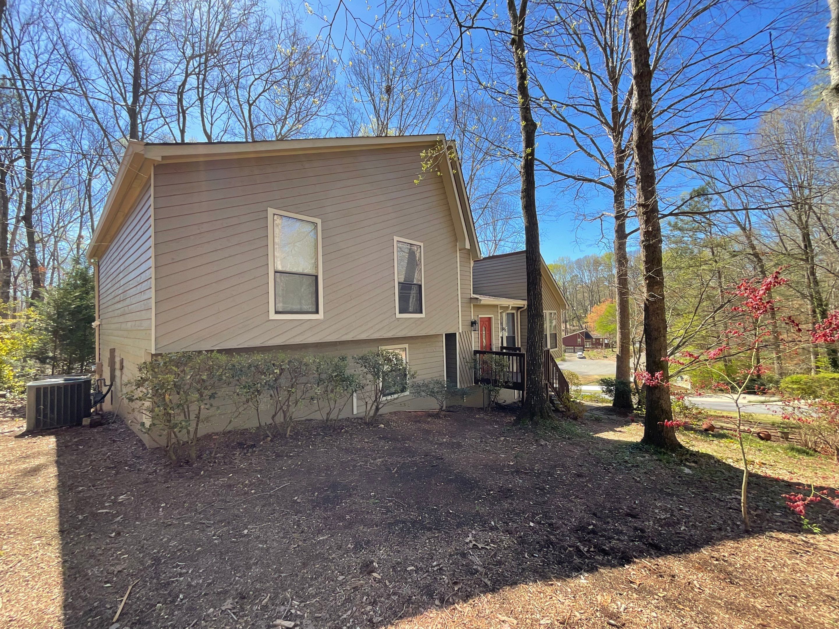 Exterior Painting and Deck Refinishing for an Acworth Residence by Swift Home Renovations