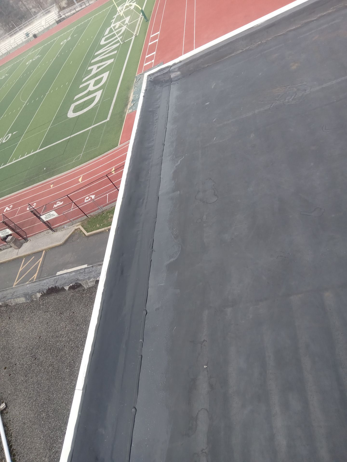 Commercial Roofing using Roof Replacement by Absolute Roofing and Construction