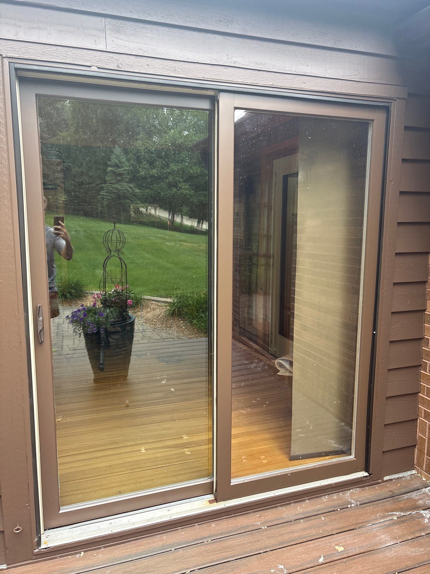Sioux Falls Exterior Painting and Solid Color Deck Staining by Select Painting, Coatings & Garage Cabinets
