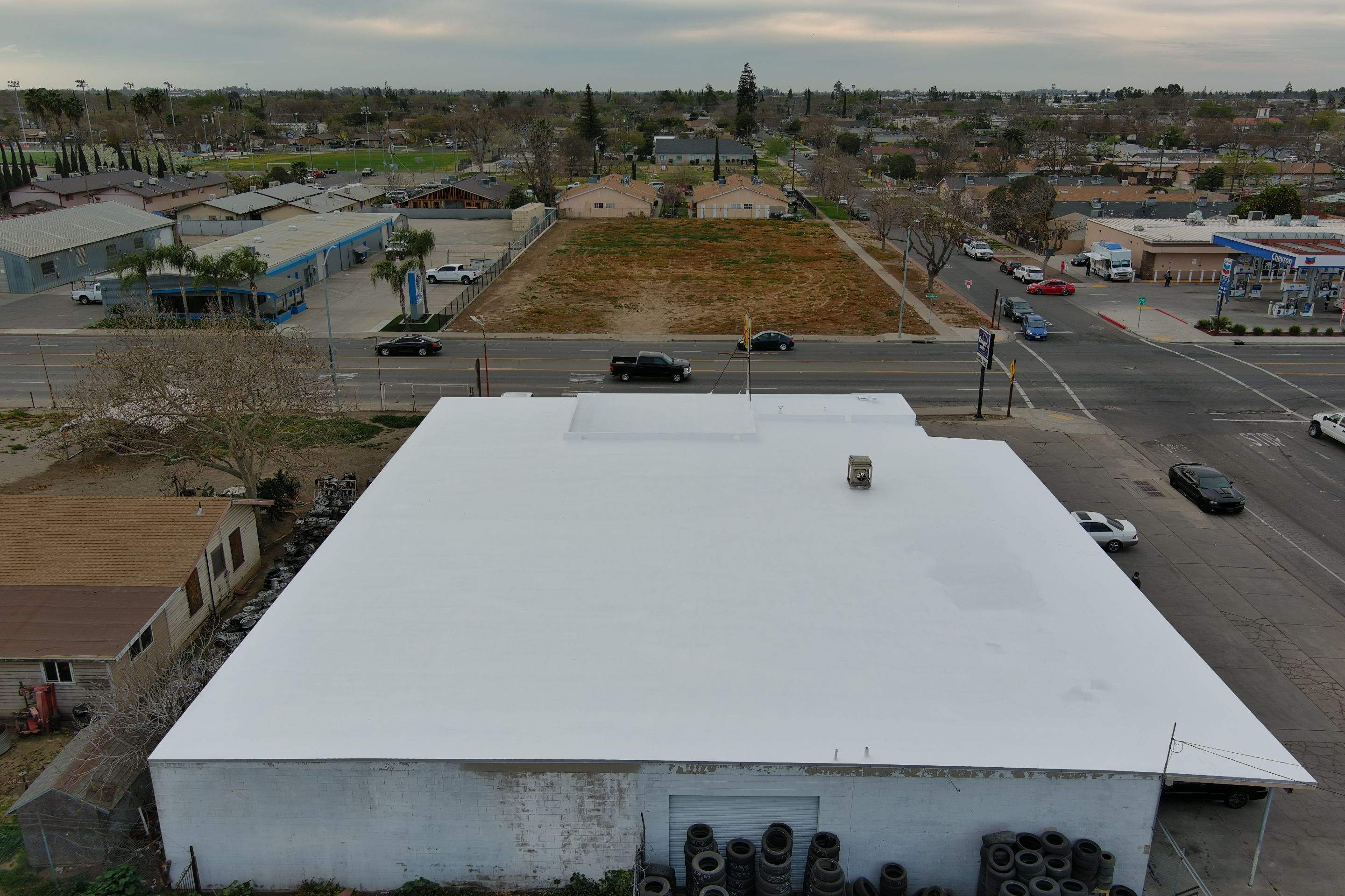 Spray foam and coatings using Conklin Benchmark/PUMA XL coatings and spray foam by Straight Edge Roofing Inc