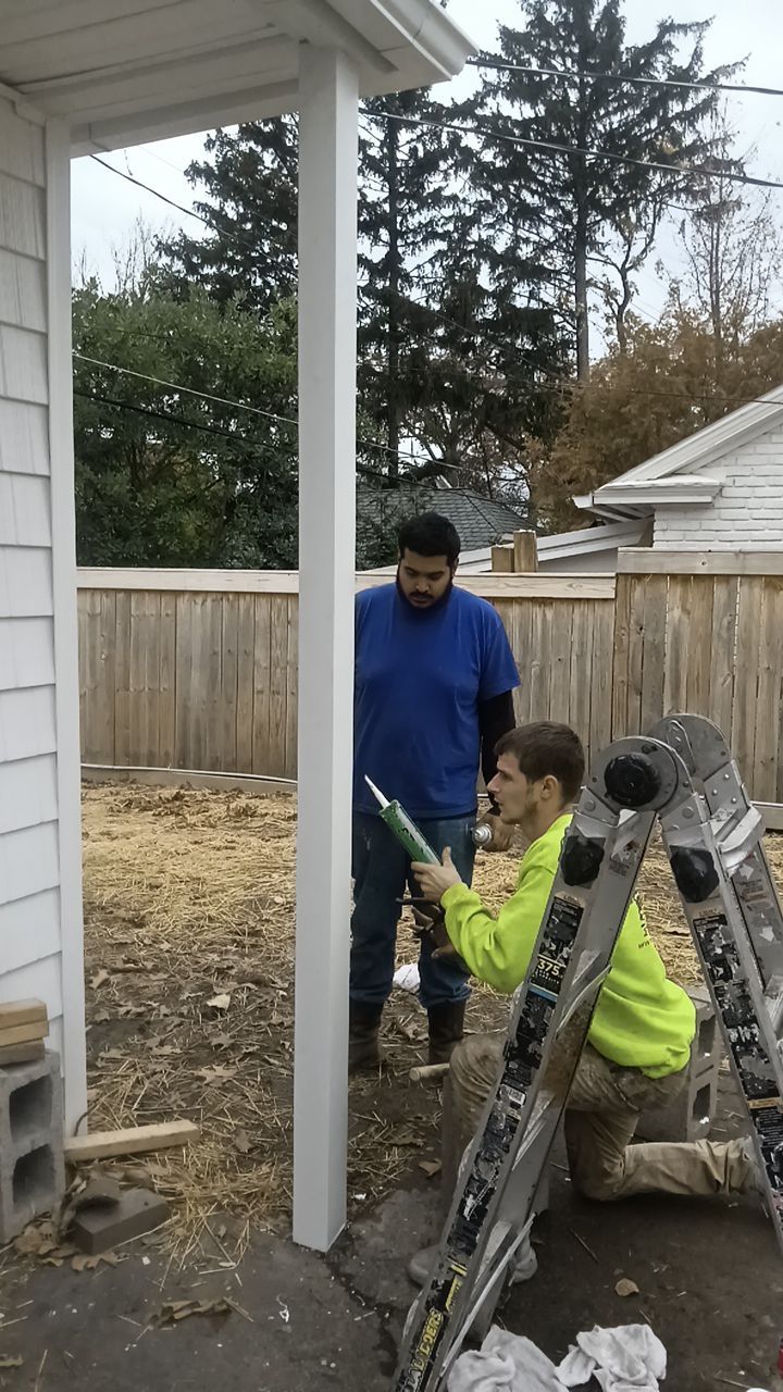 Residential Roofing Installation, Dec-tek walk-out porch roof, siding on garage by Absolute Roofing and Construction