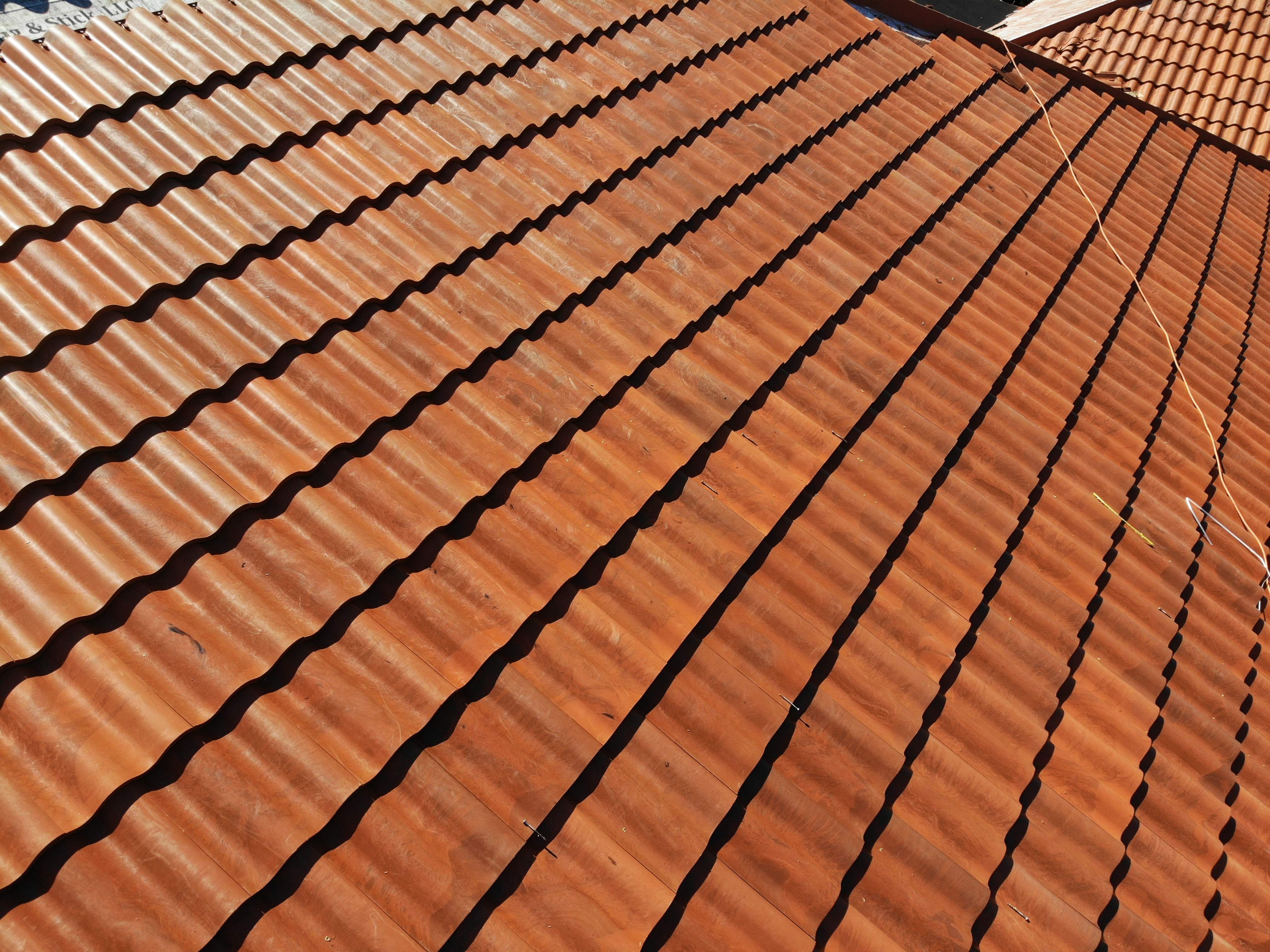 Residential Roofing Installation using Composite Spanish Tile by International Roofing