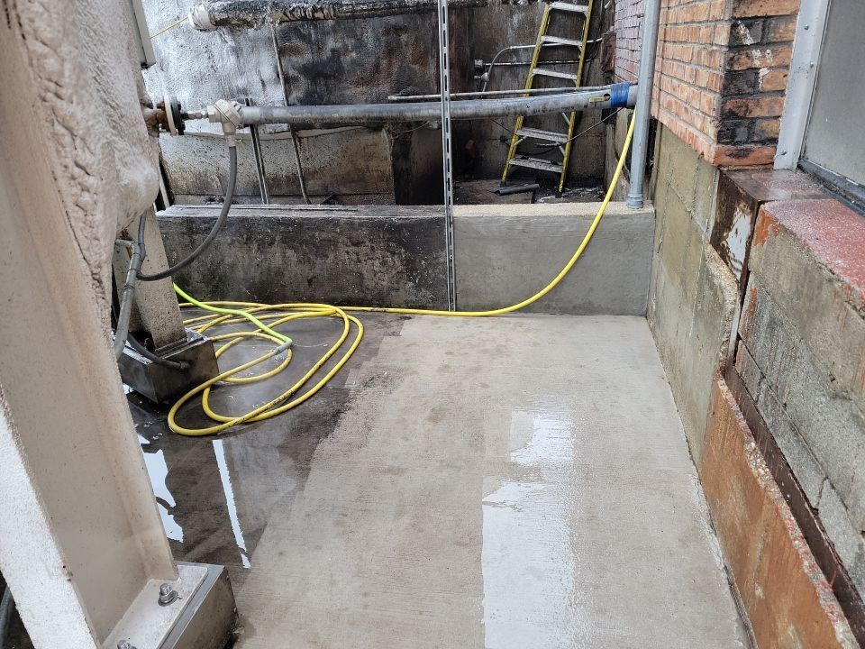 commercial pressure washing using Hot water by Northern Power Washing LLC.