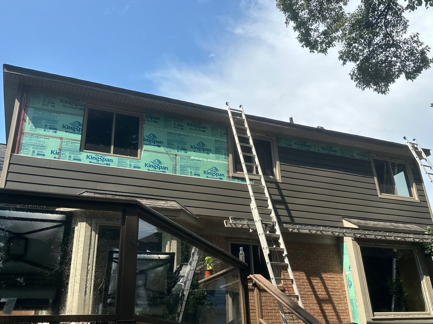 Roof Replacement using Owens Corning Peppercorn and Siding Replacement using Ascend Charcoal Smoke by 180 Contractors