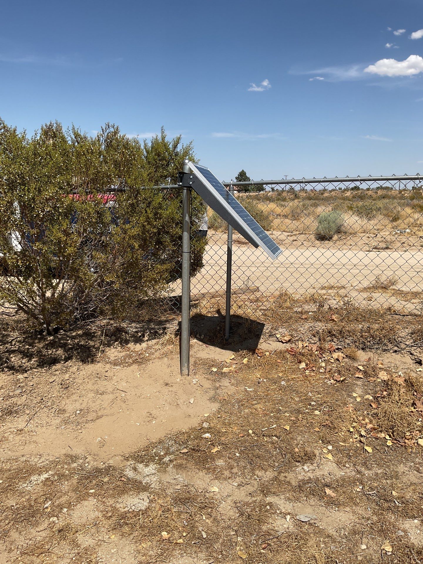 4ft White Vinyl & Chain link Slider Gate with Solar Motor by Fence Guys Inc.