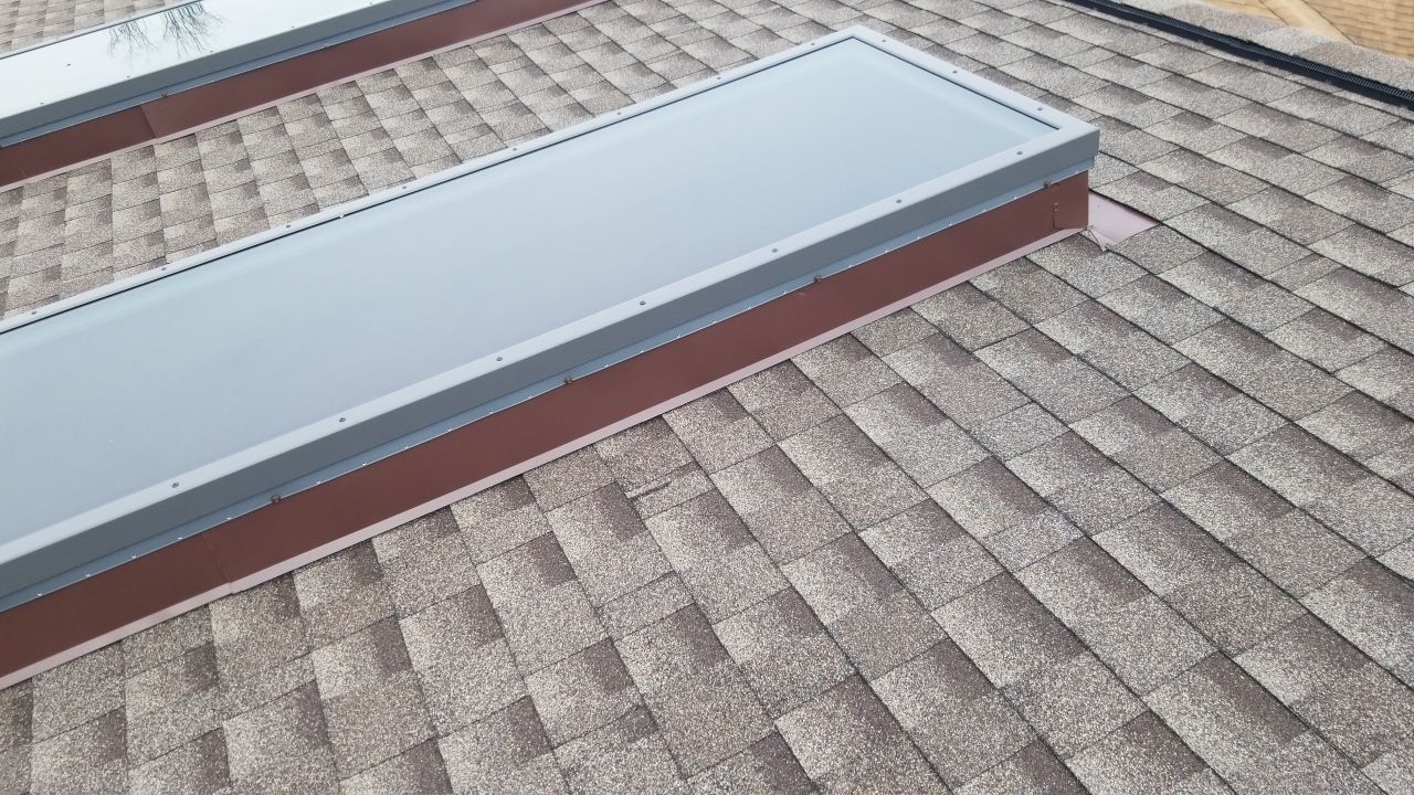 Skylight removal and install  by Absolute Roofing and Construction