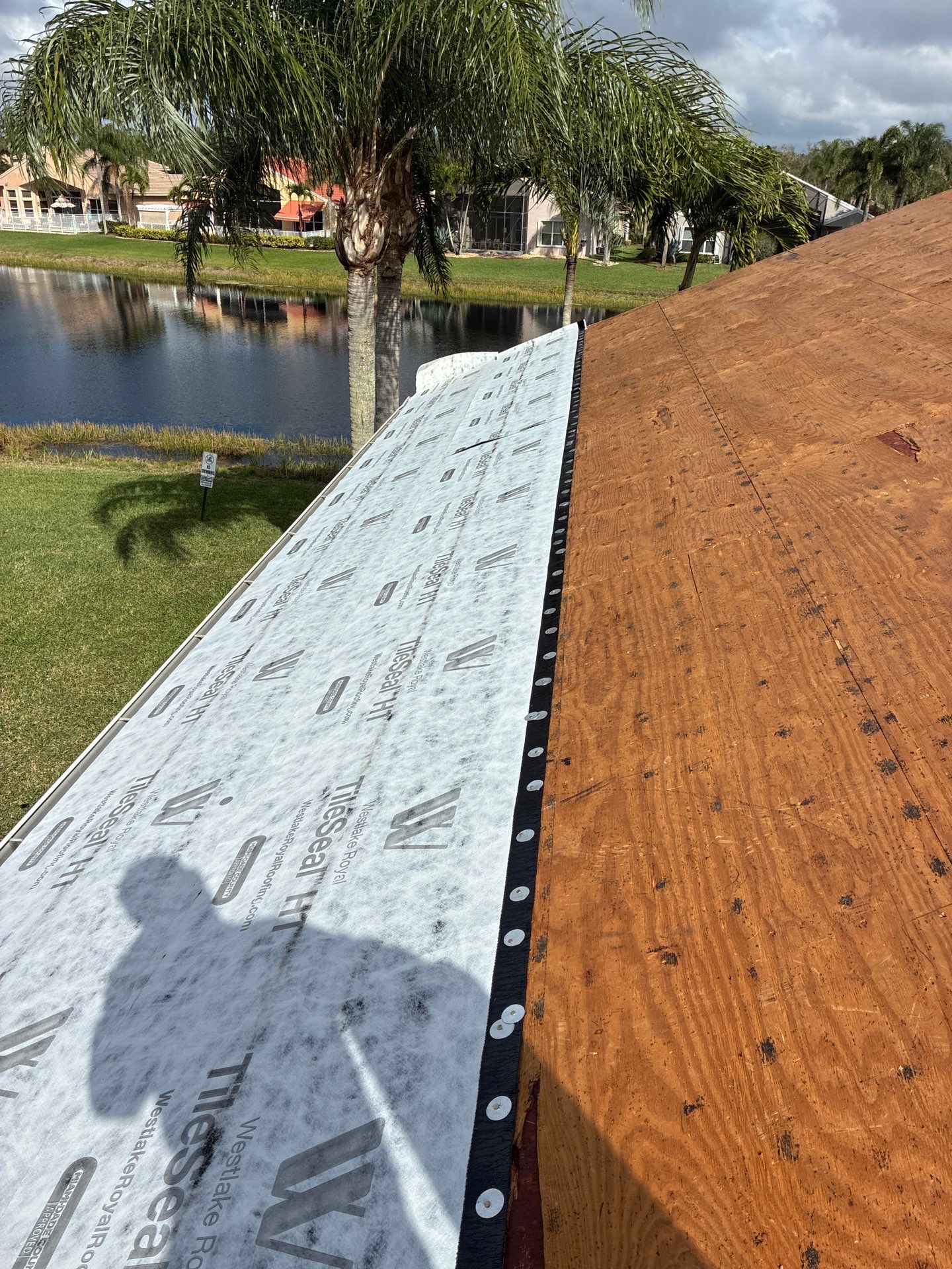 Full Concrete S-Tile Roof Replacement and Deck Repair in Wellington by Aastro Roofing