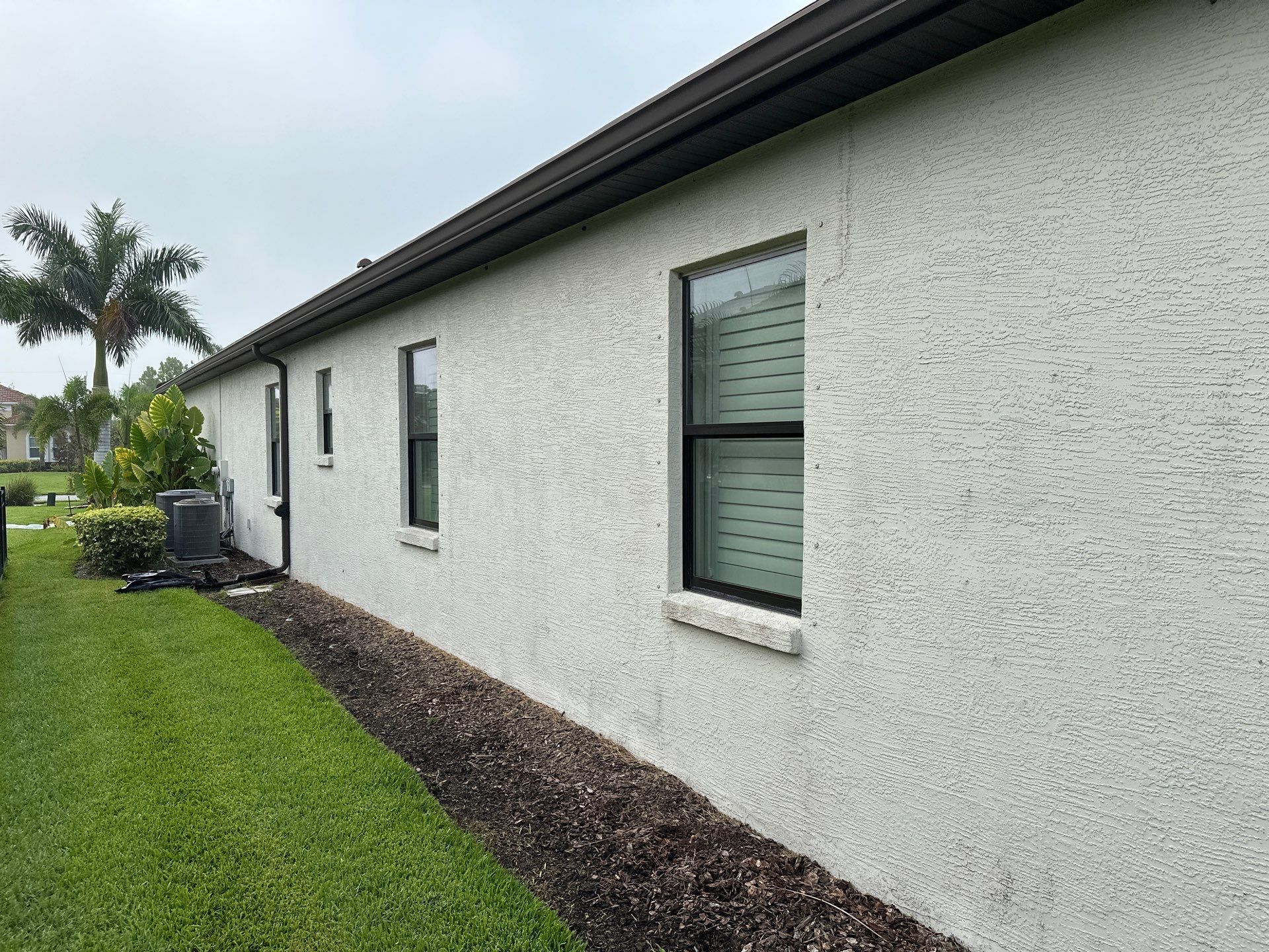 Flat Tile Roof Cleaning, House Wash & Sidewalk Cleaning in Enclave at Country Meadows, Bradenton, FL | Sunshine AquaWash by Sunshine AquaWash