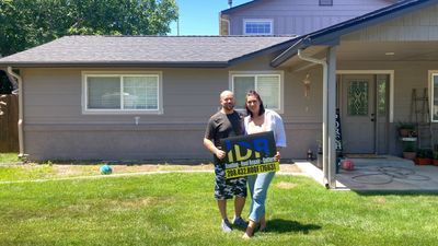 Breaking News!  Happy Homeowner gets a fantastic new roof