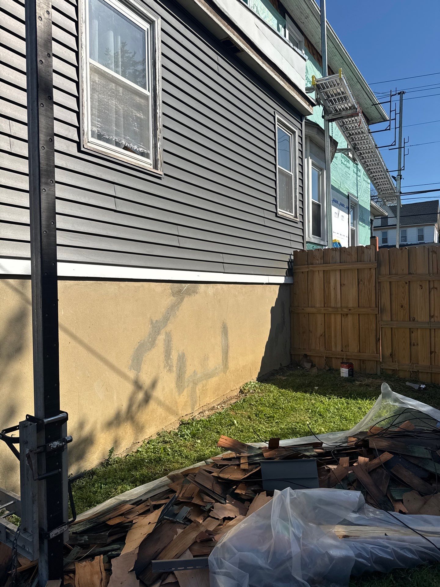 New siding & New Gutters by Alpha Design Services