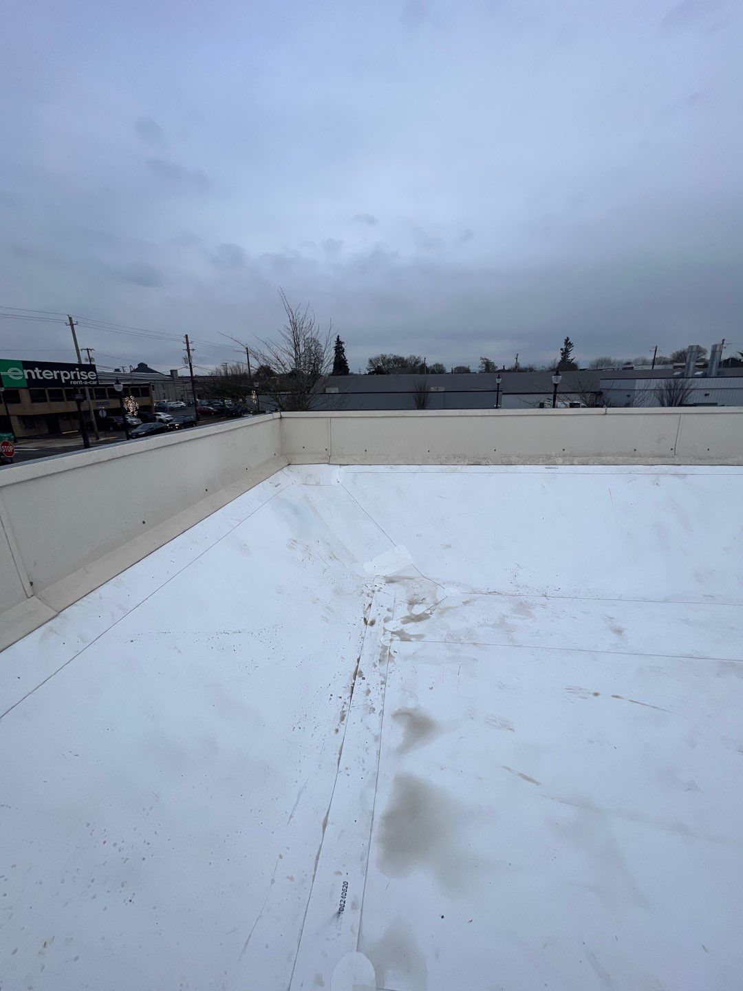 Commercial Flat Roof Installation using GAF 60Mil TPO  by Orezona Building & Roofing Company, Inc.