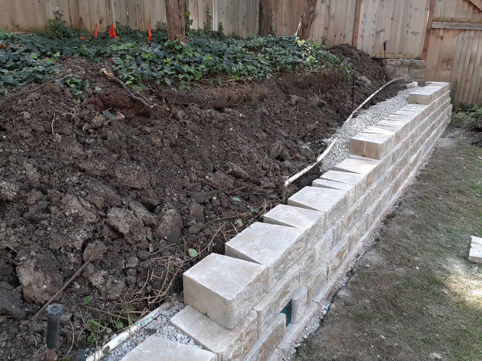 Back Yard Harington Retaining Wall by LAND ESCAPES LLC