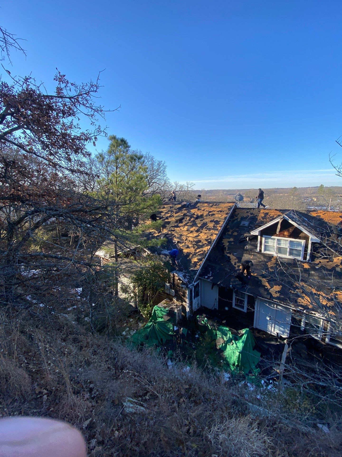 Roof Replacement on a private lake near Ardmore by BANA Roofing and Solar Supply