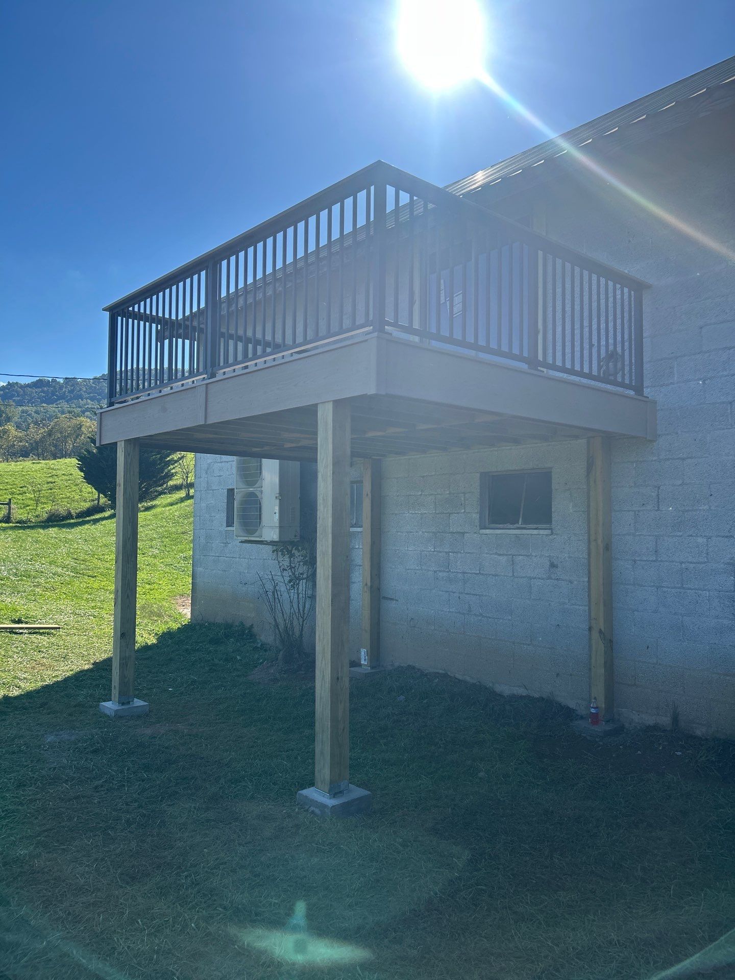 Elevated Composite Deck in Ronceverte by Walnut Hollow Decks & Outdoor Living