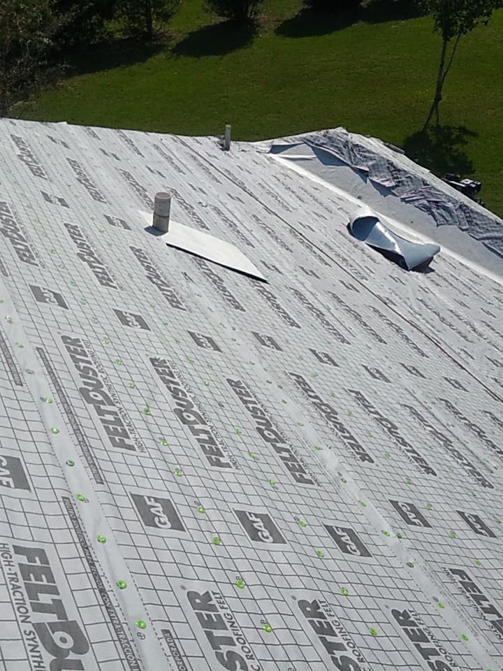 Residential Roofing Installation using Roof Replacement by American Roofing & Construction LLC