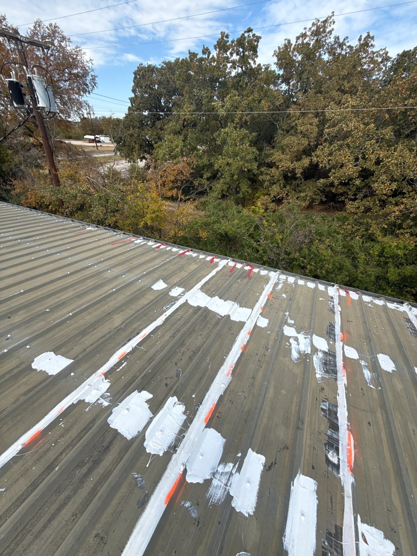 Silicone Coating Metal Rehab by First Out Roofing 