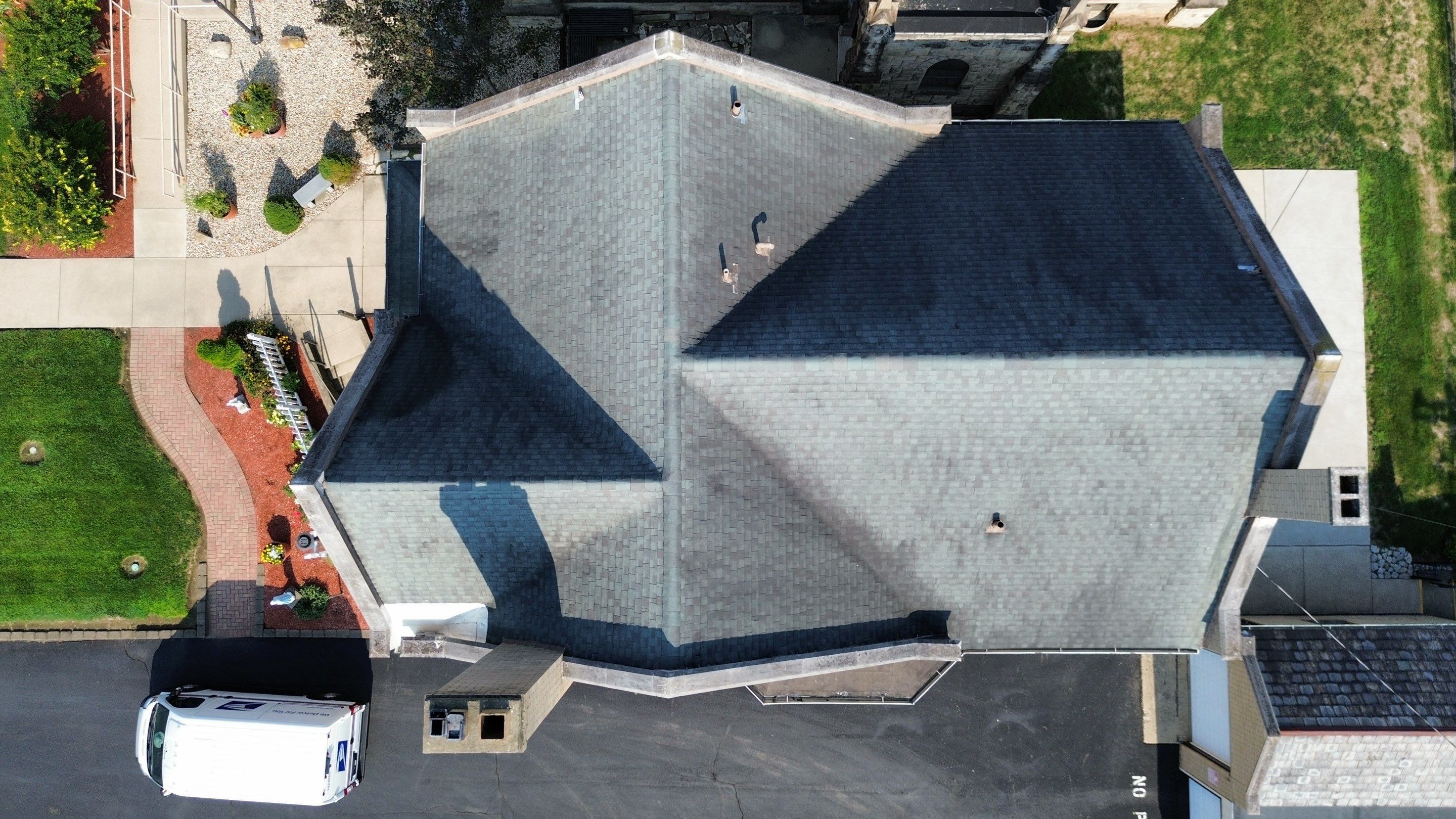 Commercial Roofing Installation using Standing Seam Metal - Frost Black by RoofX 